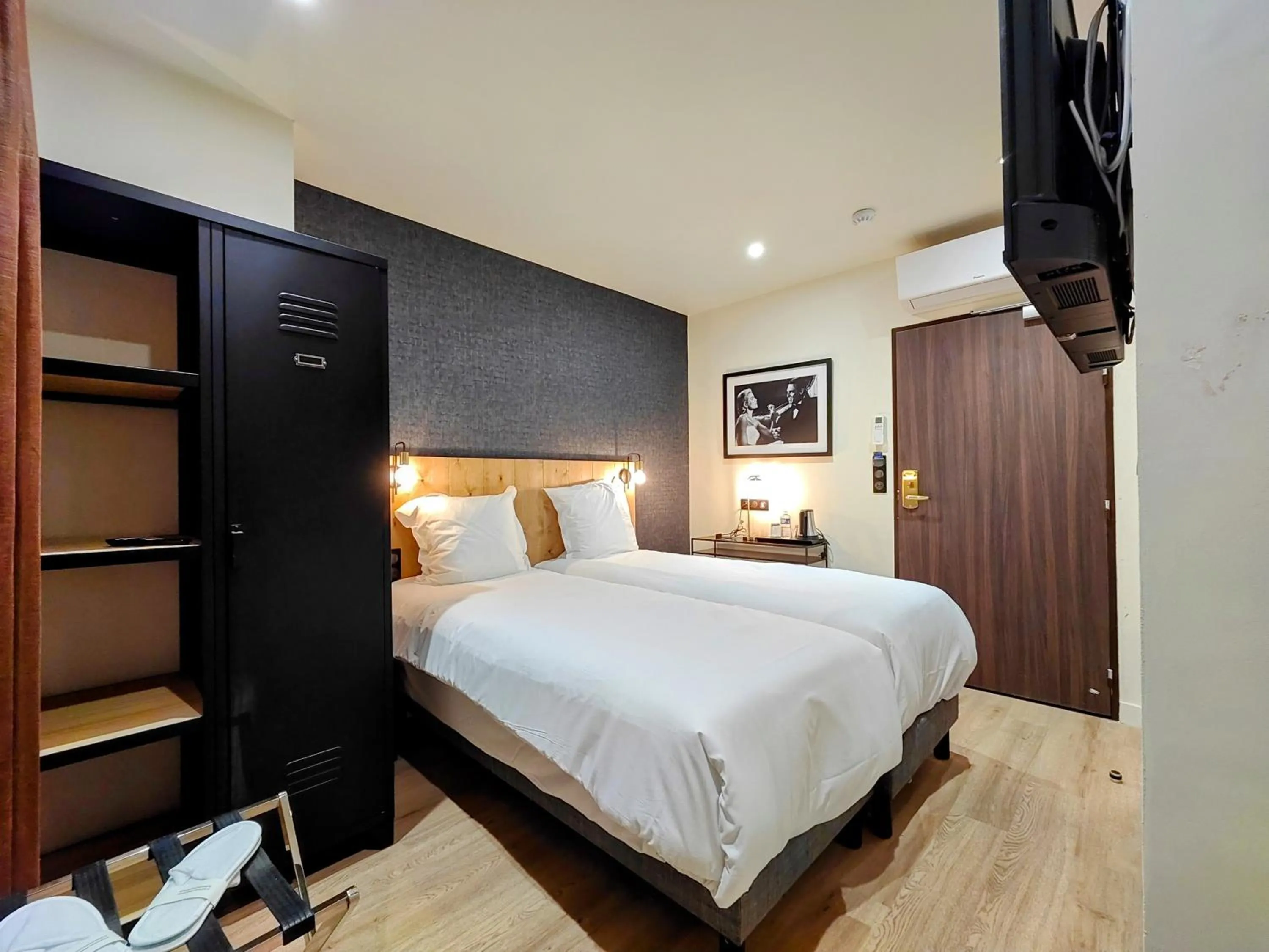 Bed in Hotel Acadie Eragny