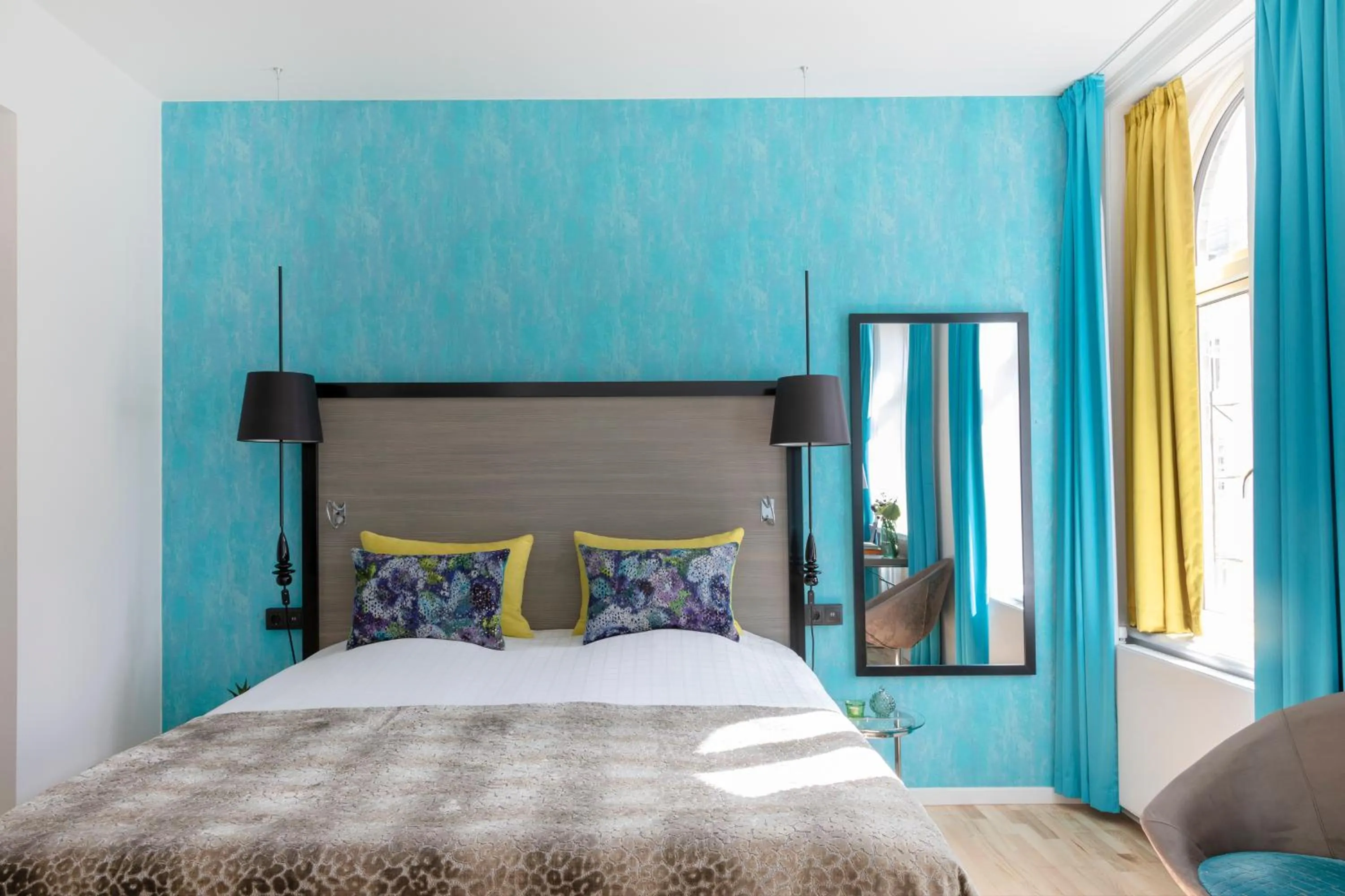 Bed in Andersen Boutique Hotel