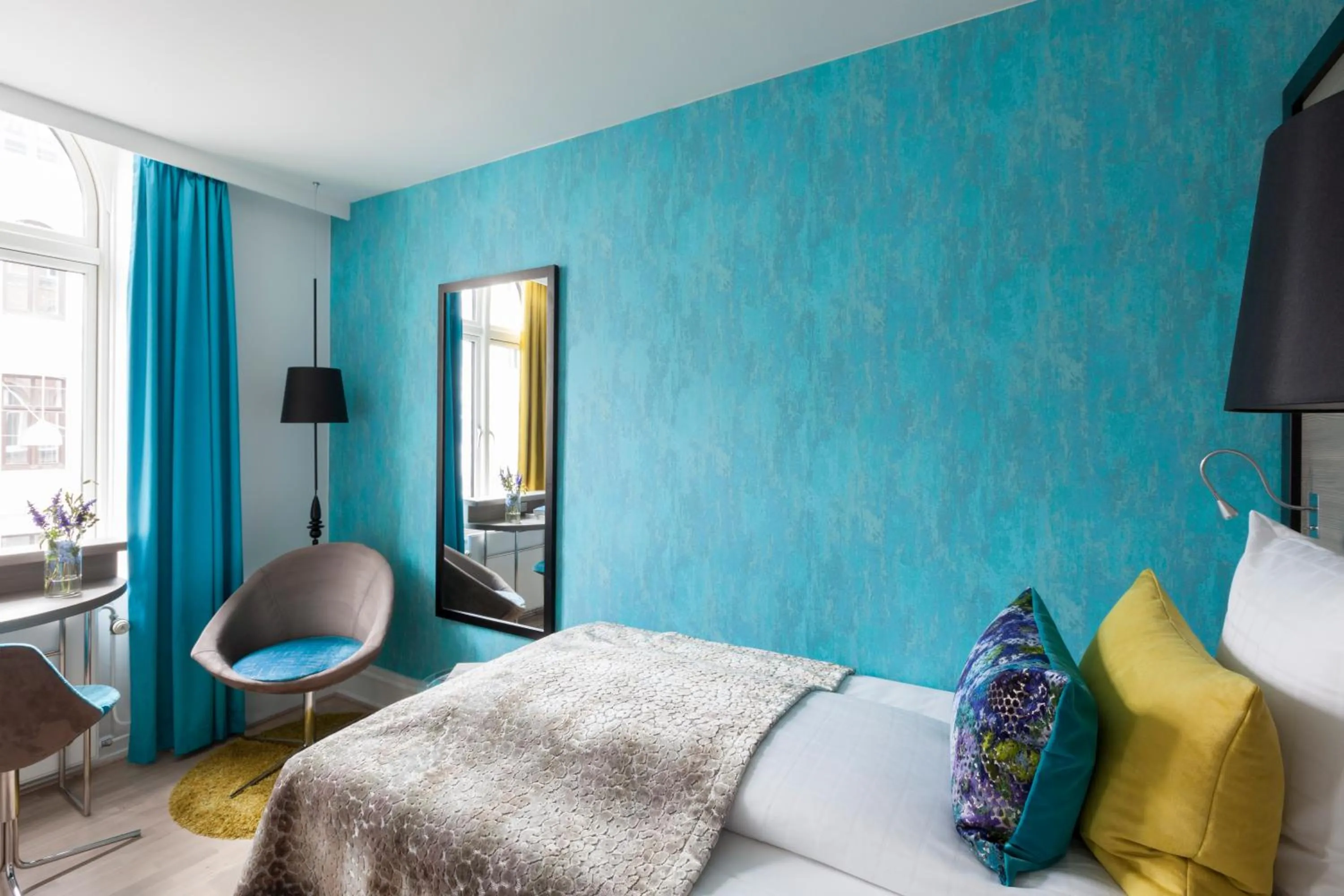 Seating area, Bed in Andersen Boutique Hotel