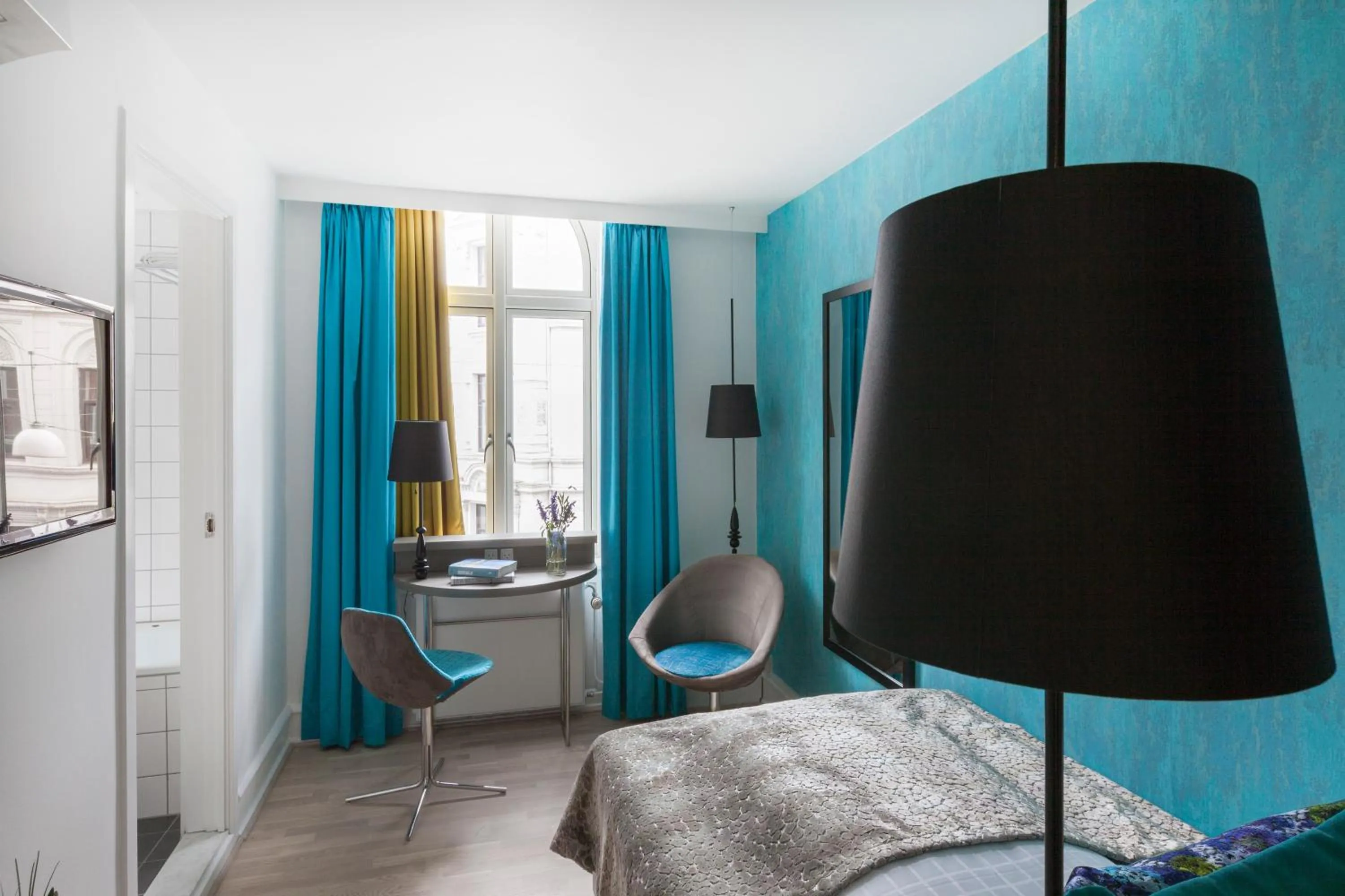 Seating area, Bed in Andersen Boutique Hotel