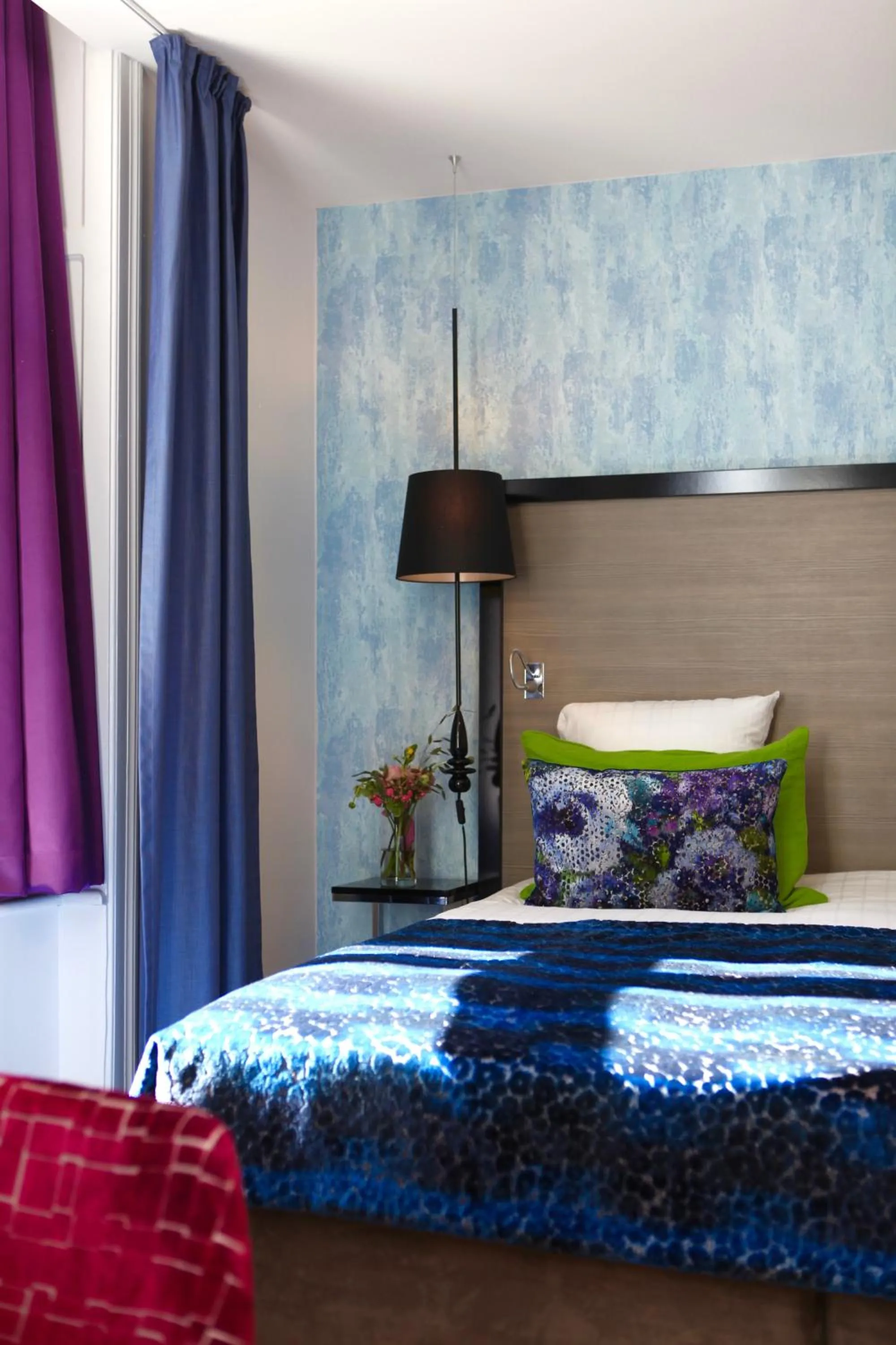 Bed in Andersen Boutique Hotel