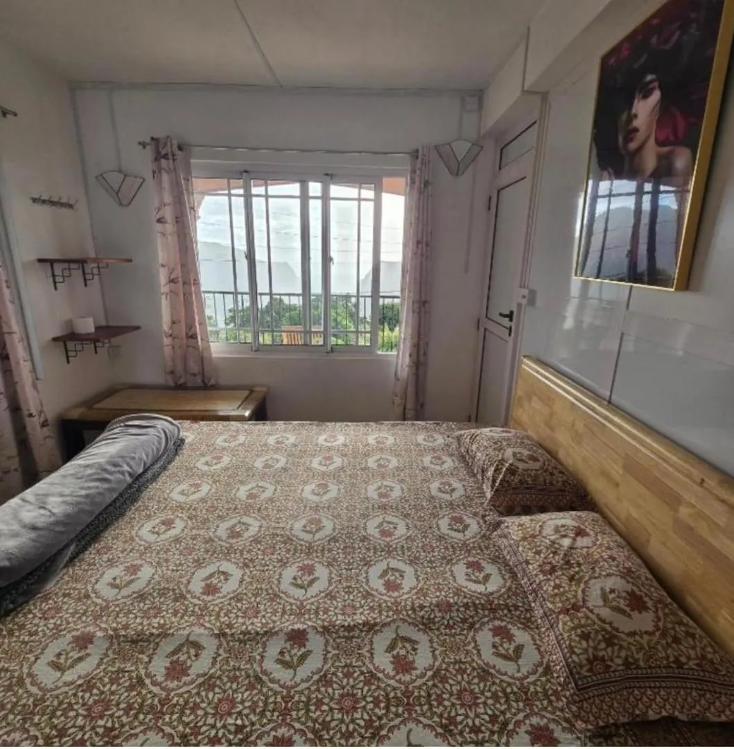 Bed in Green Discovery B&B Tamarind Falls 7 Cascades