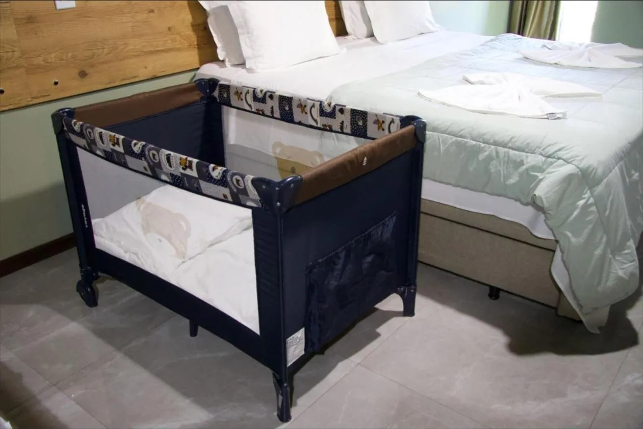 Bed in Pousada Casarão Gastehaus