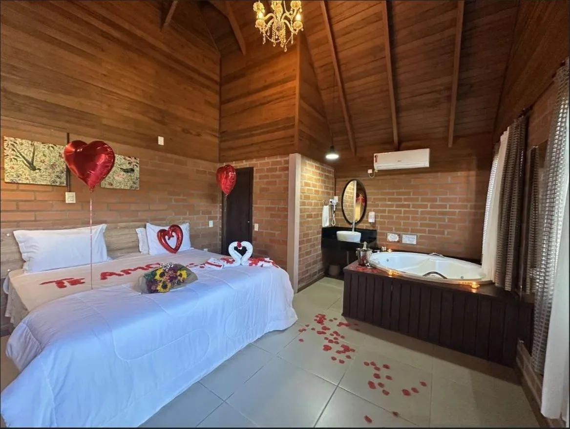 Bed in Pousada Casarão Gastehaus