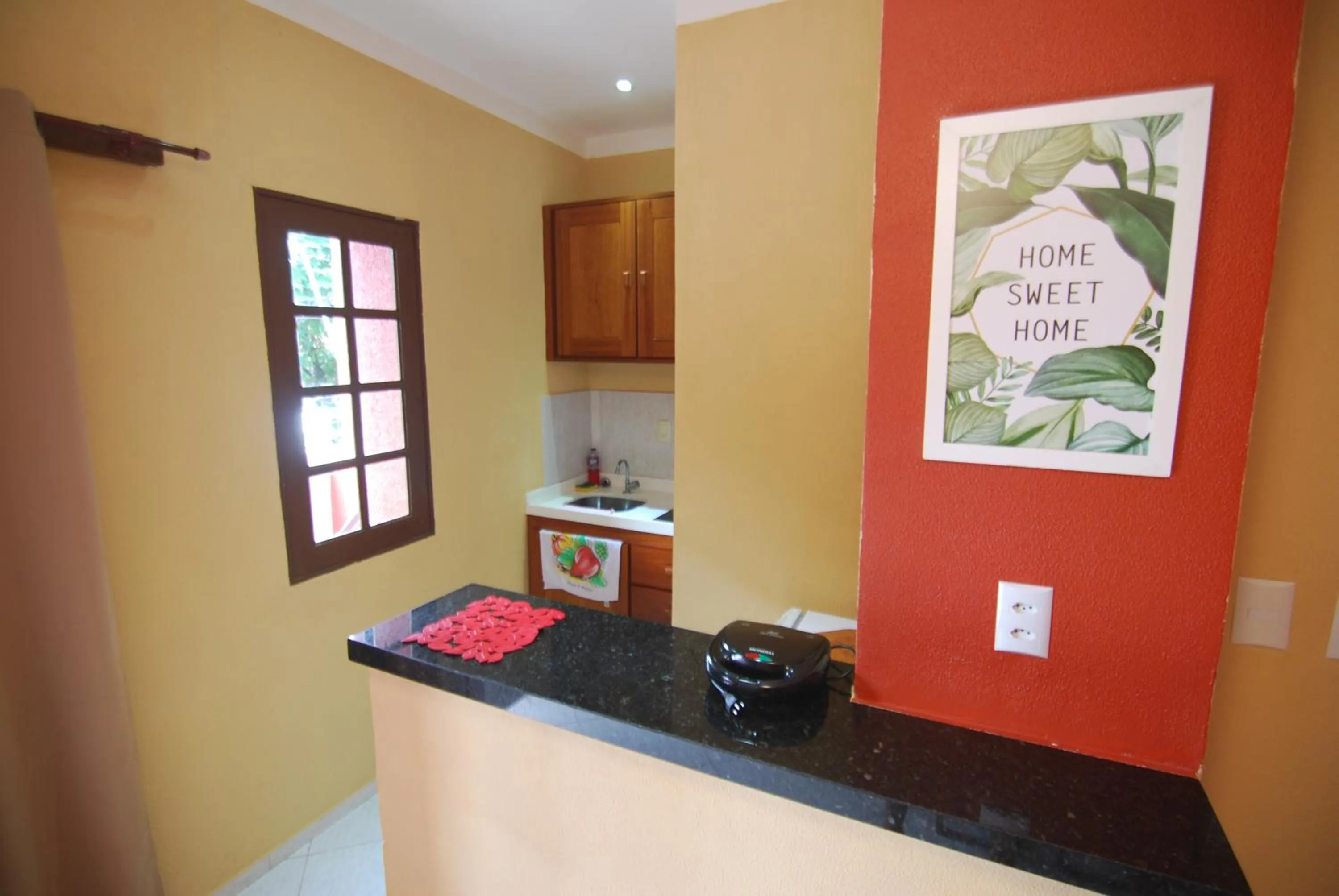 Kitchen or kitchenette in Refúgio Pousada Fortaleza