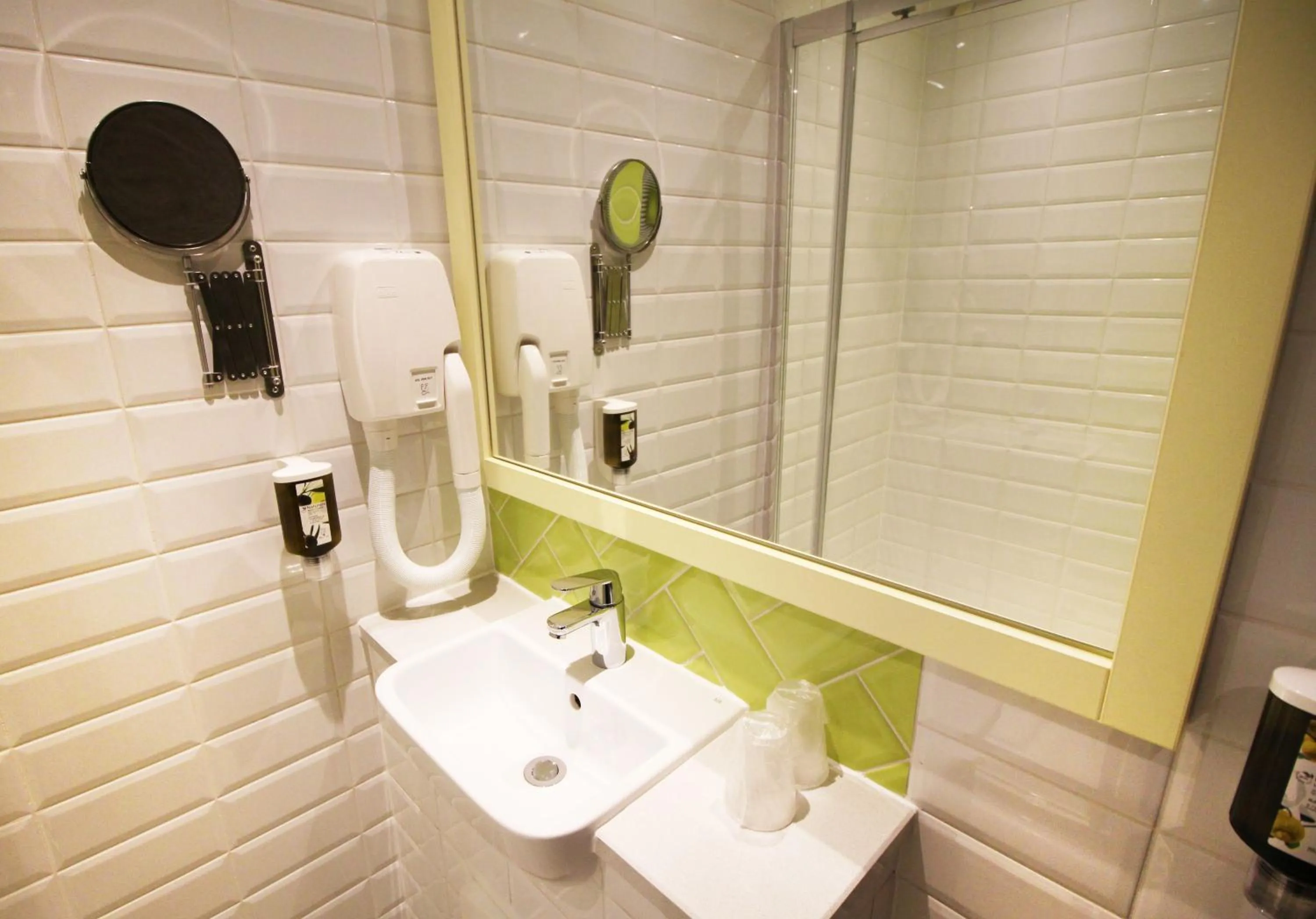 Bathroom in Best Western Plus London Wembley Hotel