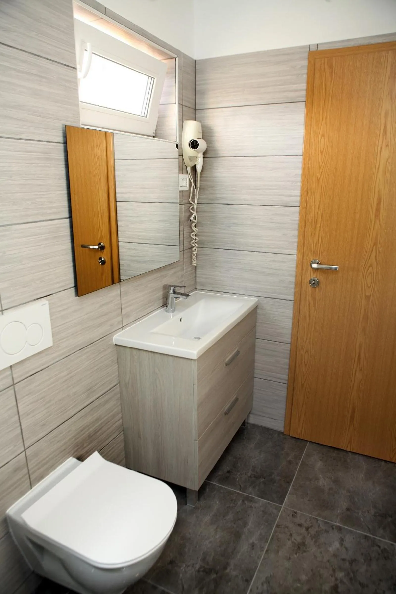 Toilet in Apartmaji sončne terase - Sunny Terraces Apartments