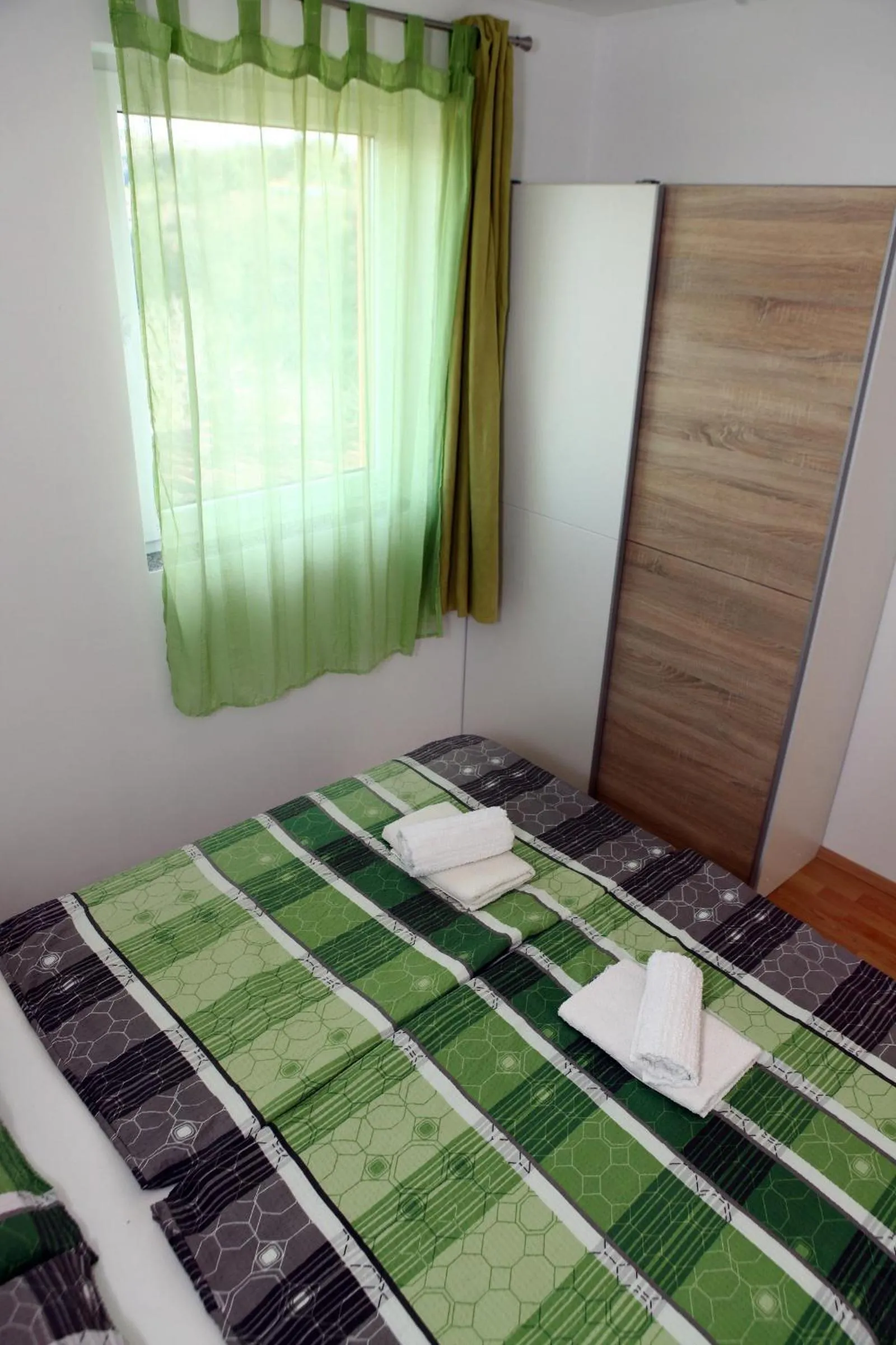 Bed in Apartmaji sončne terase - Sunny Terraces Apartments