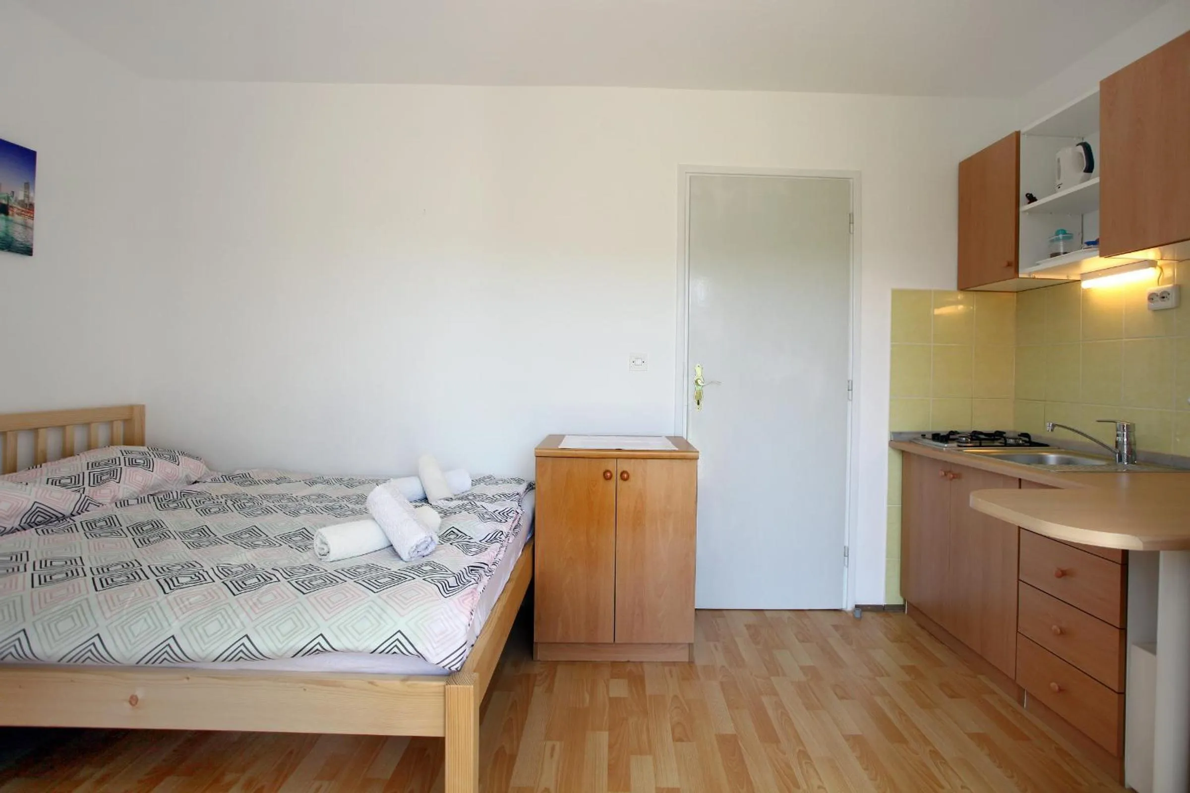 Kitchen or kitchenette, Bed in Apartmaji sončne terase - Sunny Terraces Apartments