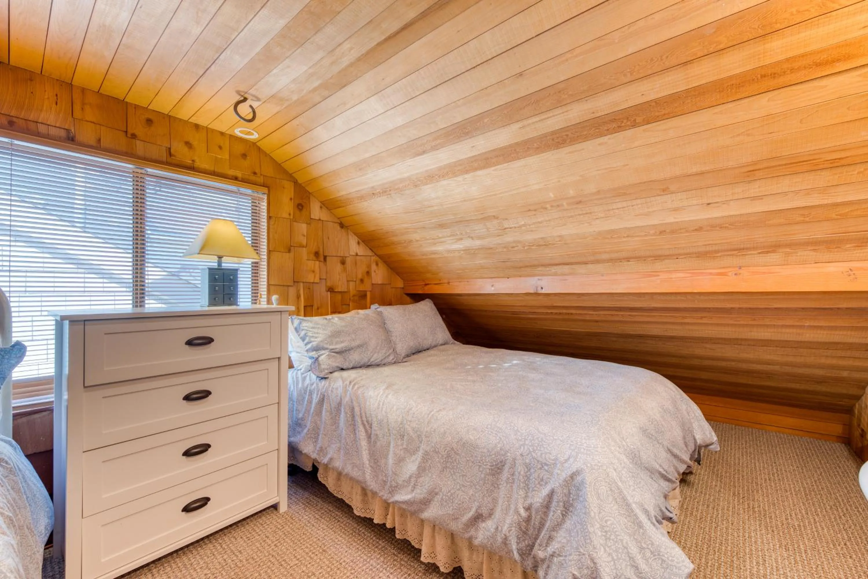 Bed in Oceanfront Cottage