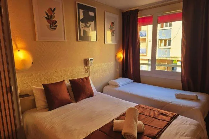 Bed in Hôtel Alexandra Centre Ville