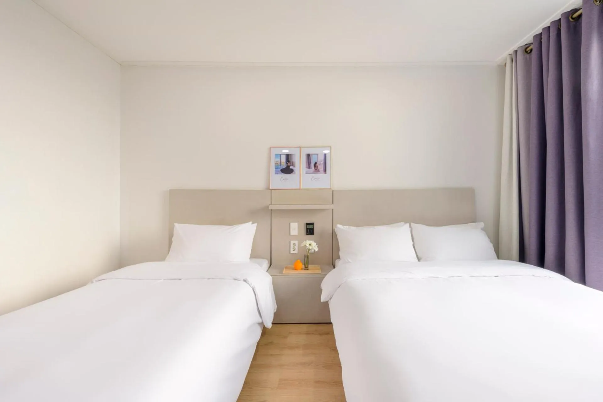 Bed in Cordelia Hotel