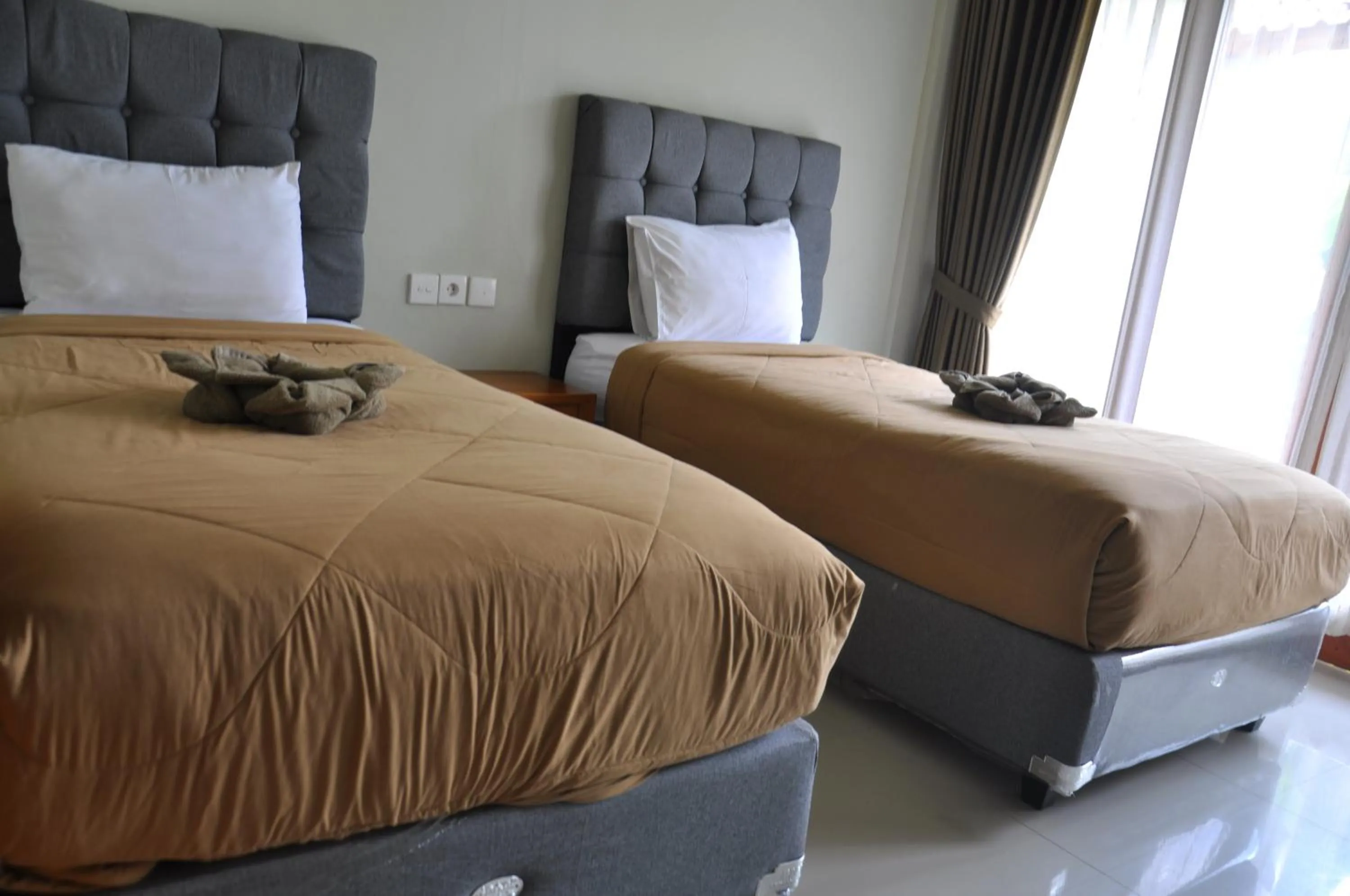 Bed in Hastina Hotel Lombok
