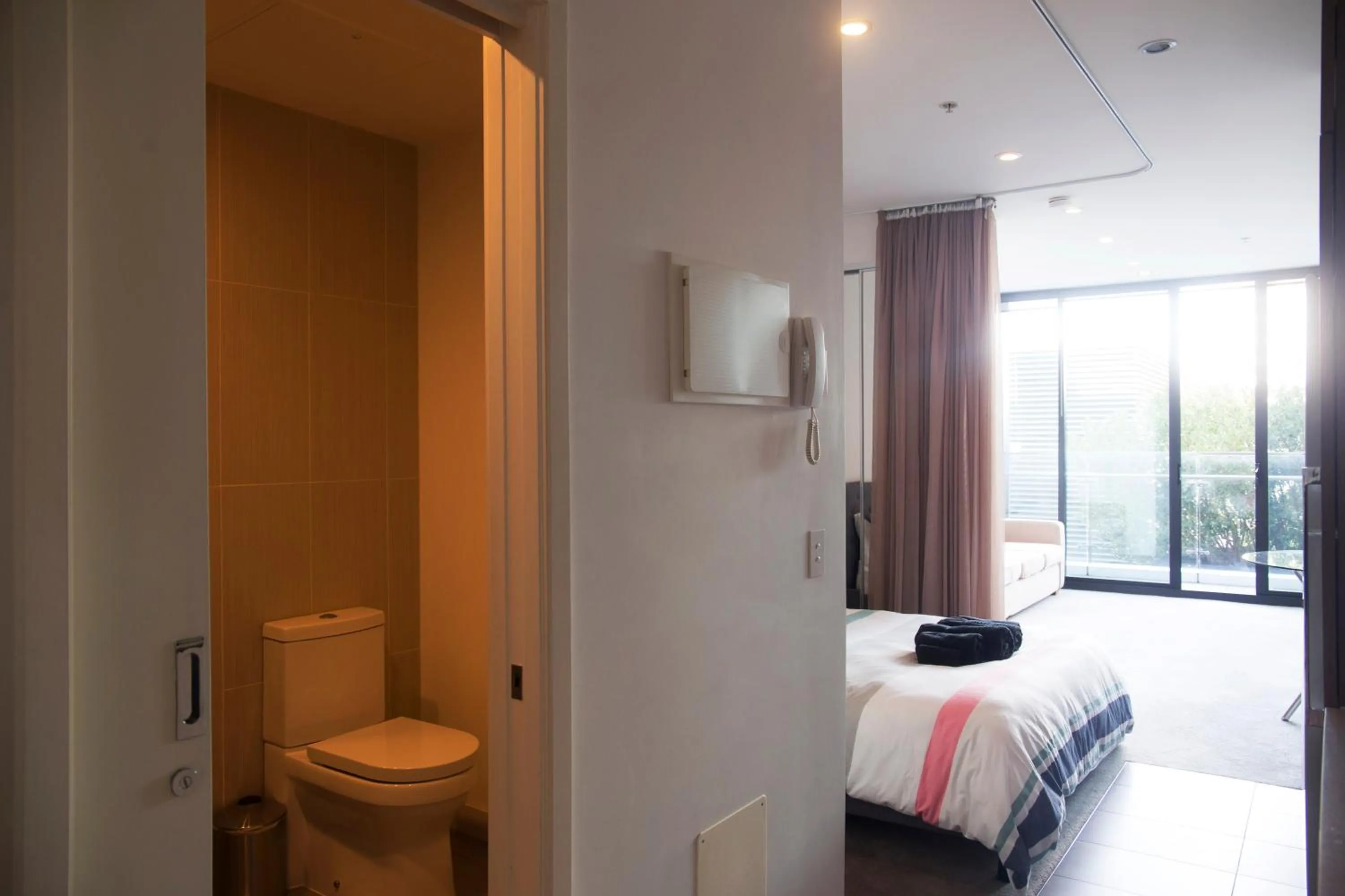 Bathroom, Bed in Amazing Accommodations: Vogue