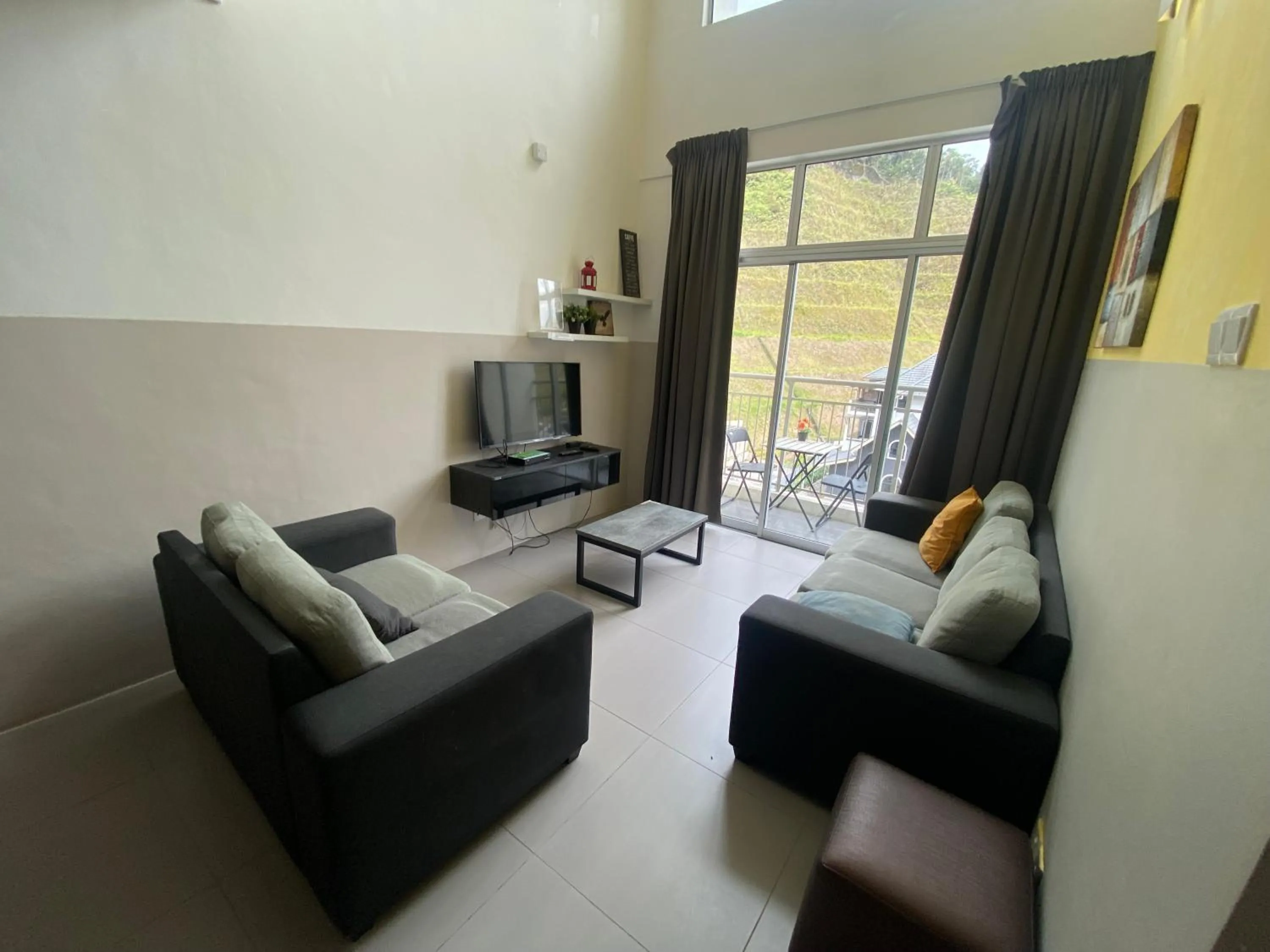 Living room in Play Residence at Golden Hills