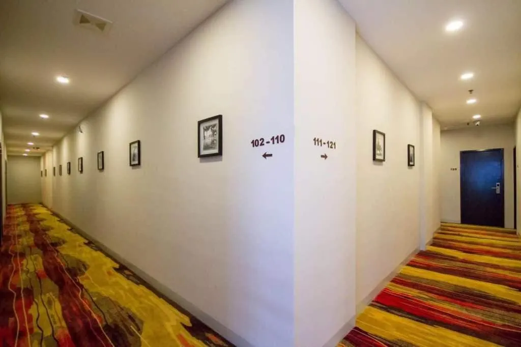 Property logo or sign in OMG Hotel