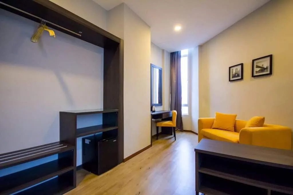 Seating area, Bed in OMG Hotel