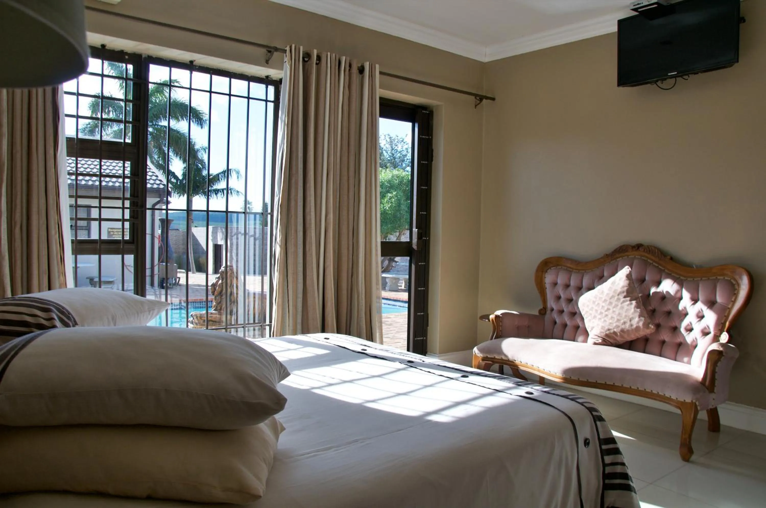 Bed in Mi Casa Guest House