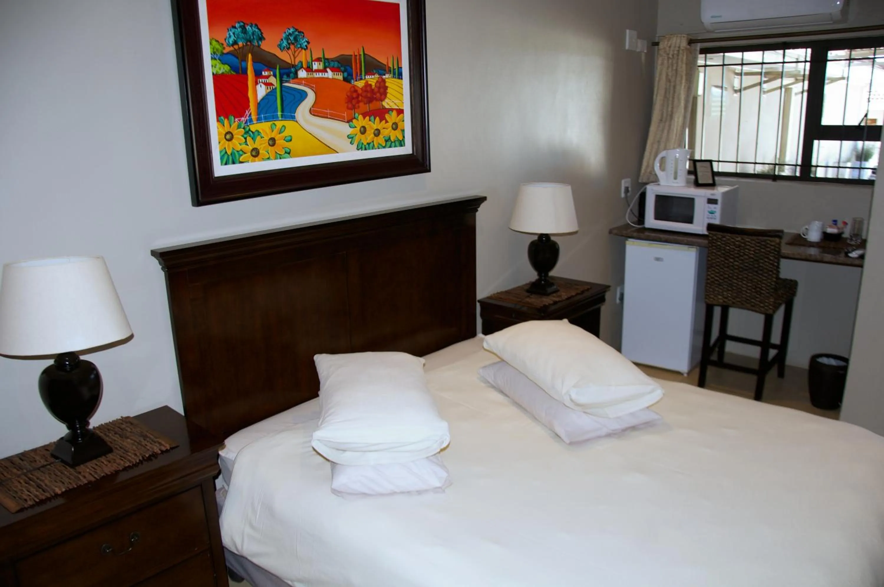 Bed in Mi Casa Guest House