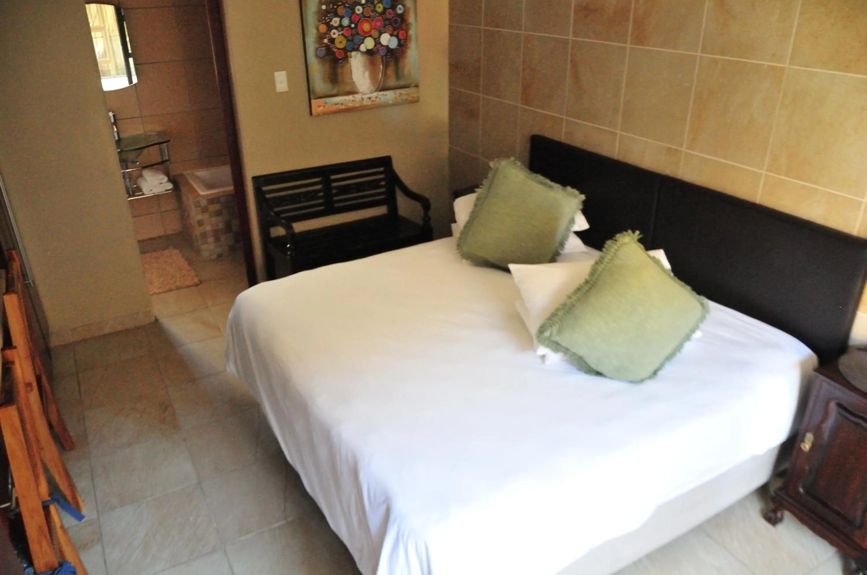 Bed in Mi Casa Guest House