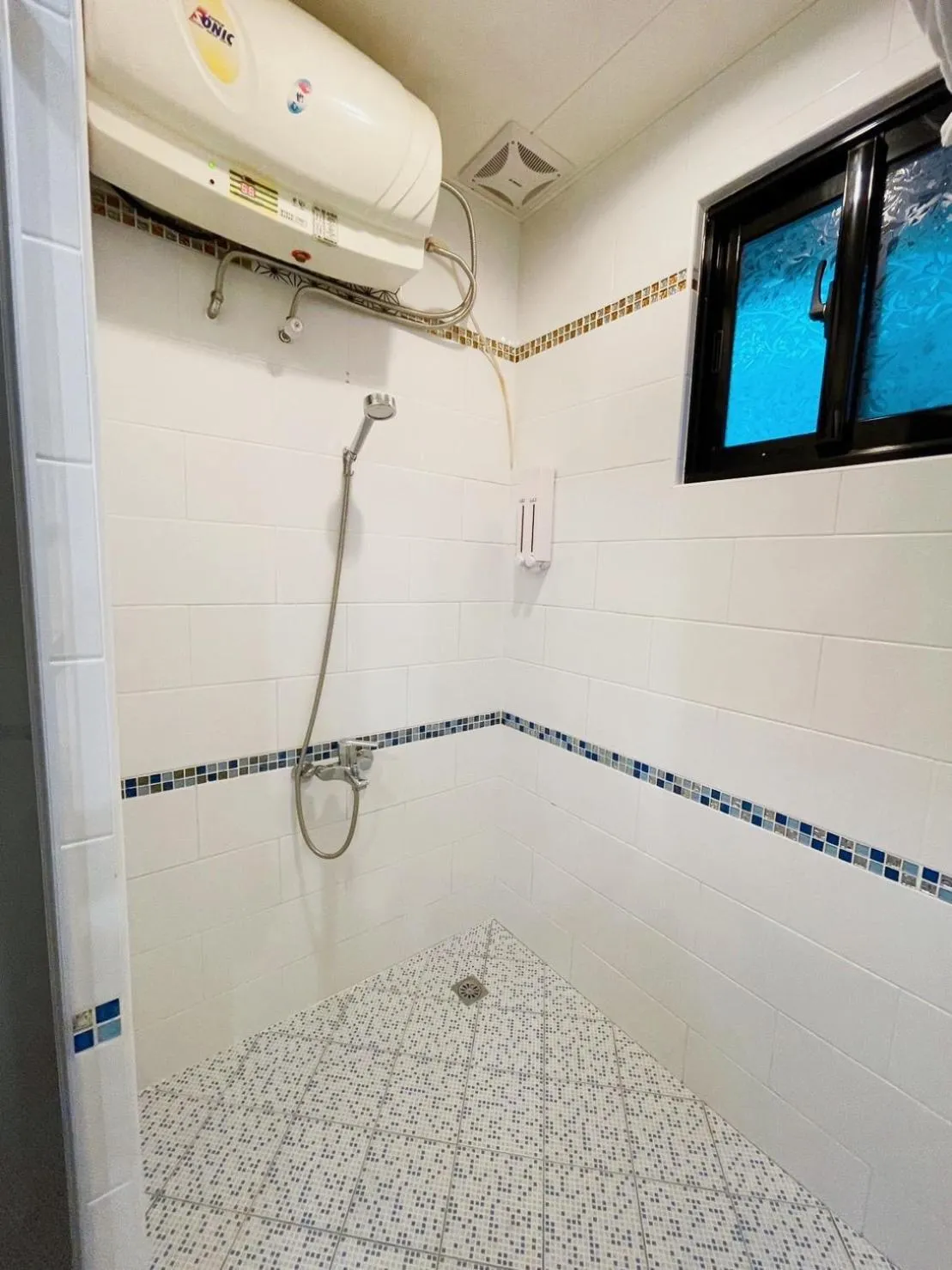 Shower in 淡水民宿-台北Yes Hotel