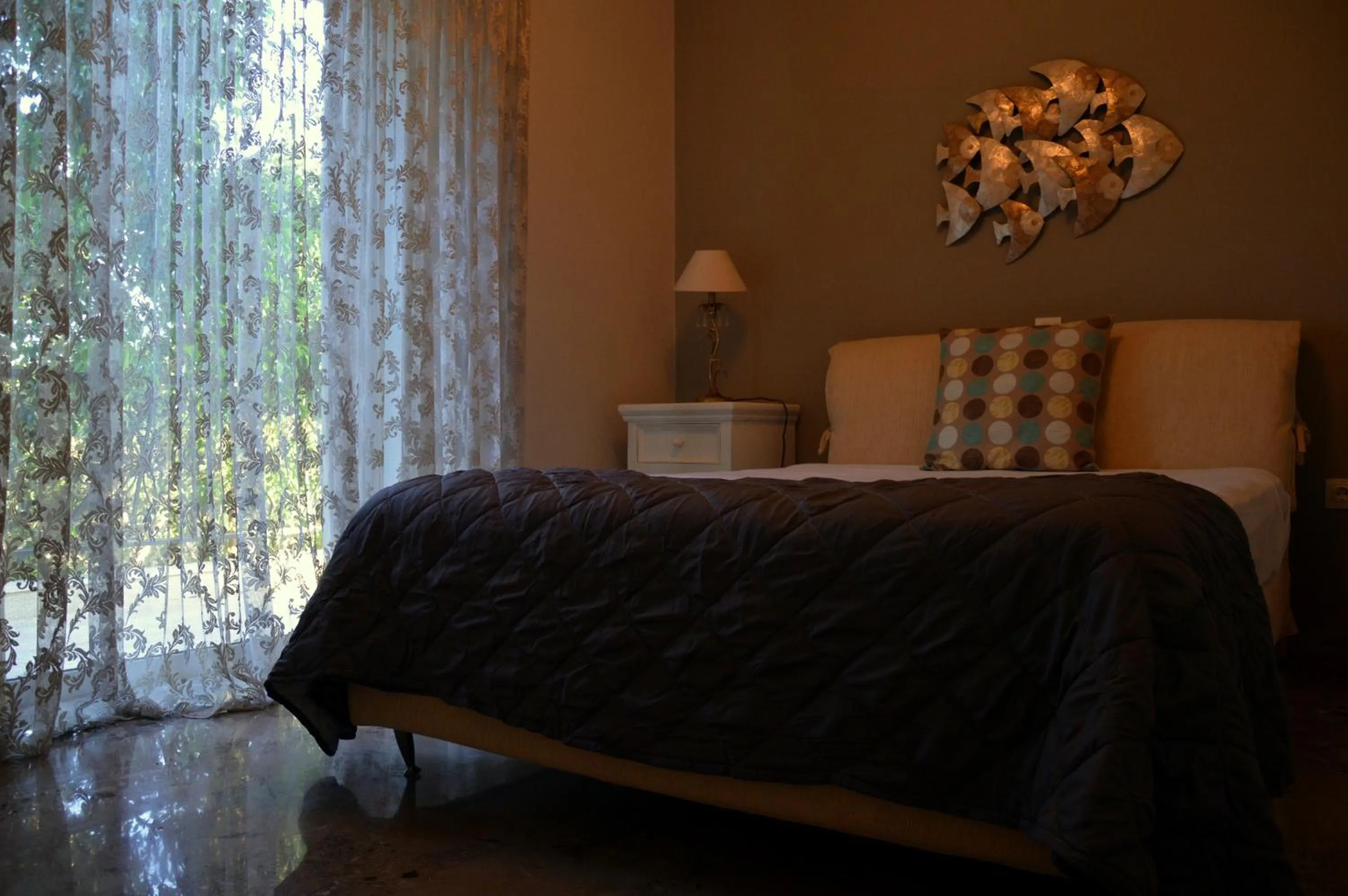 Bed in Ammos Luxury Suites