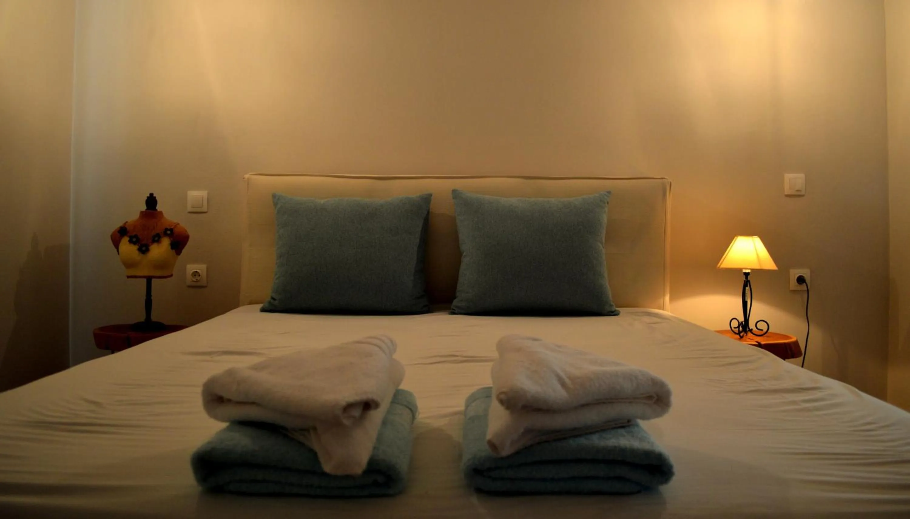 Bed in Ammos Luxury Suites