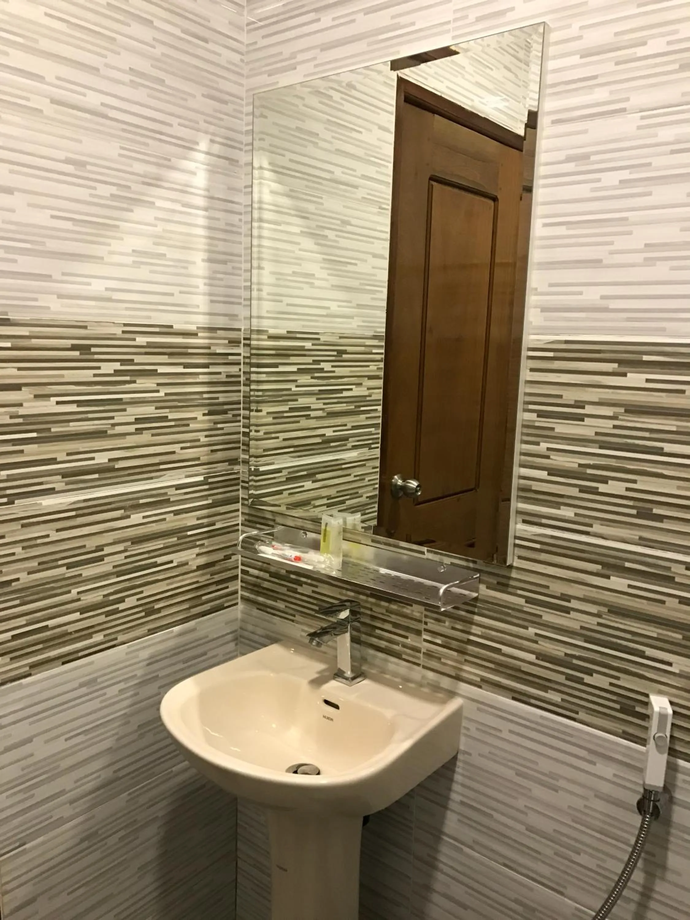 Bathroom in NKS Hotel