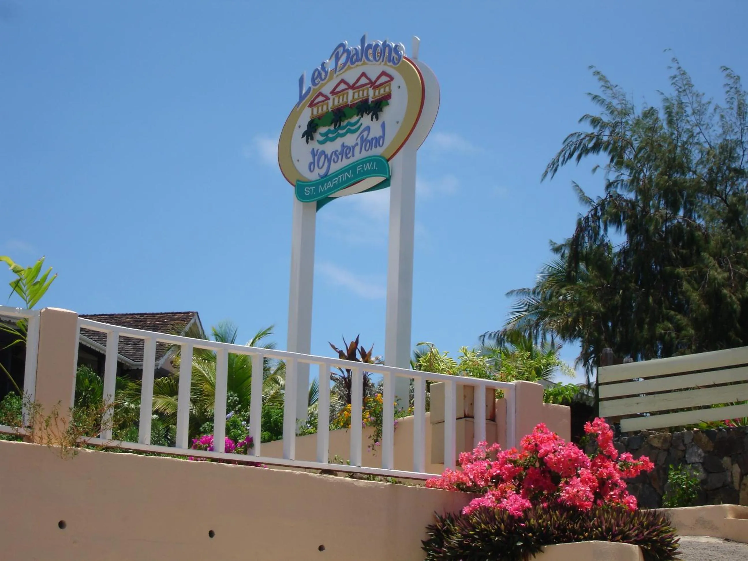 Property logo or sign in Les Balcons d'Oyster Pond