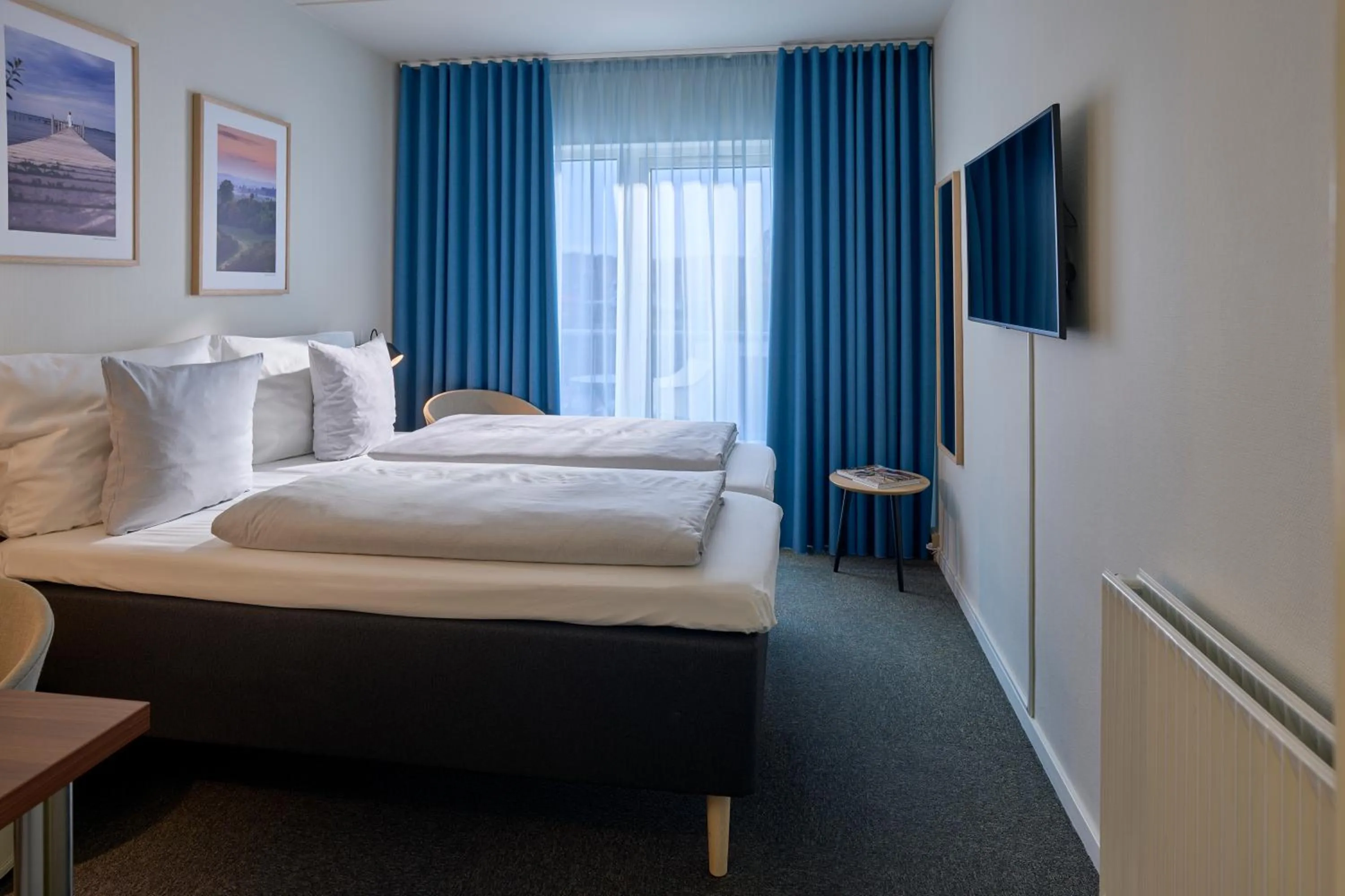 Bed in Hotel Faaborg Fjord