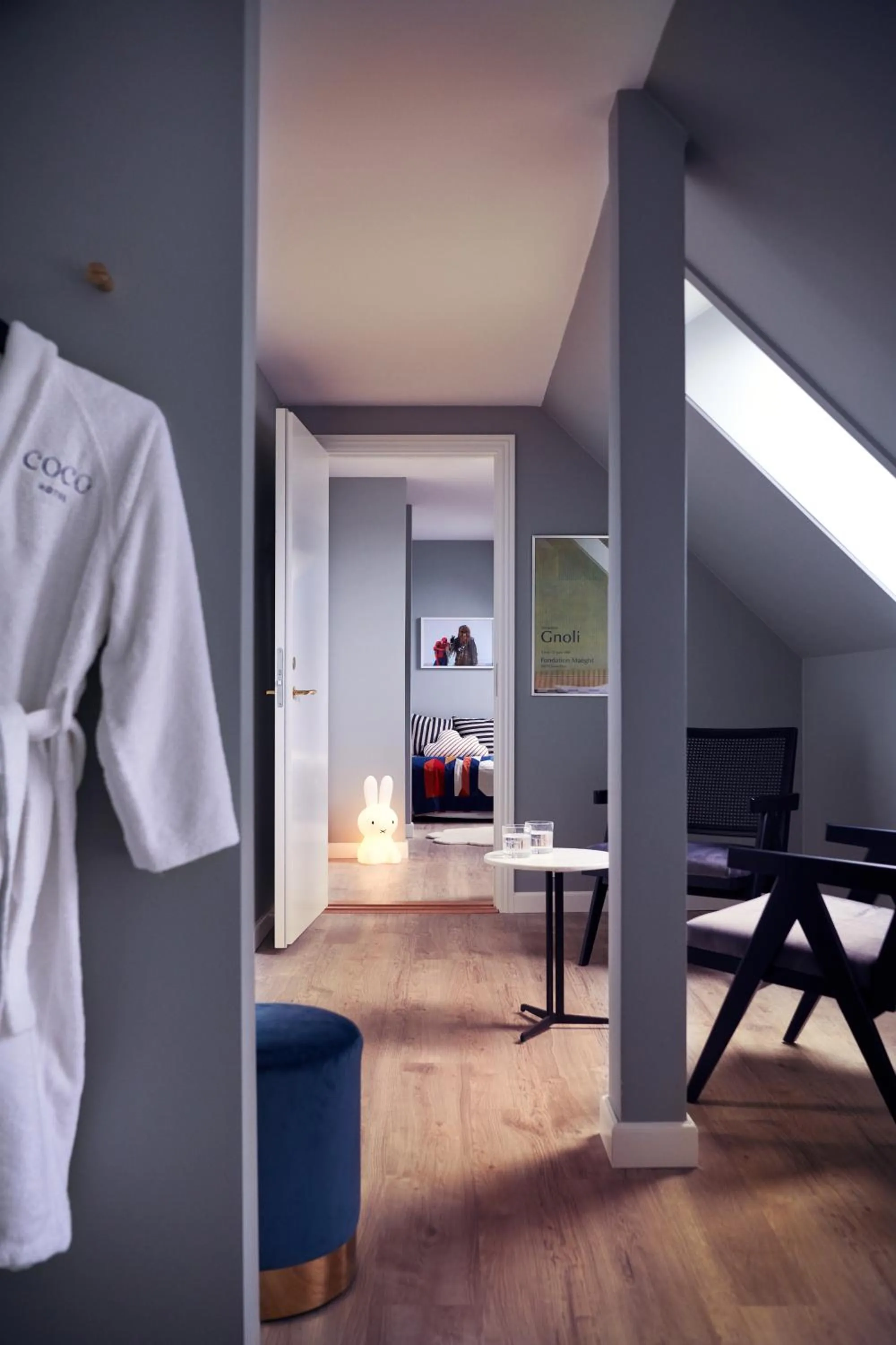 Seating area, Bed in Coco Hotel