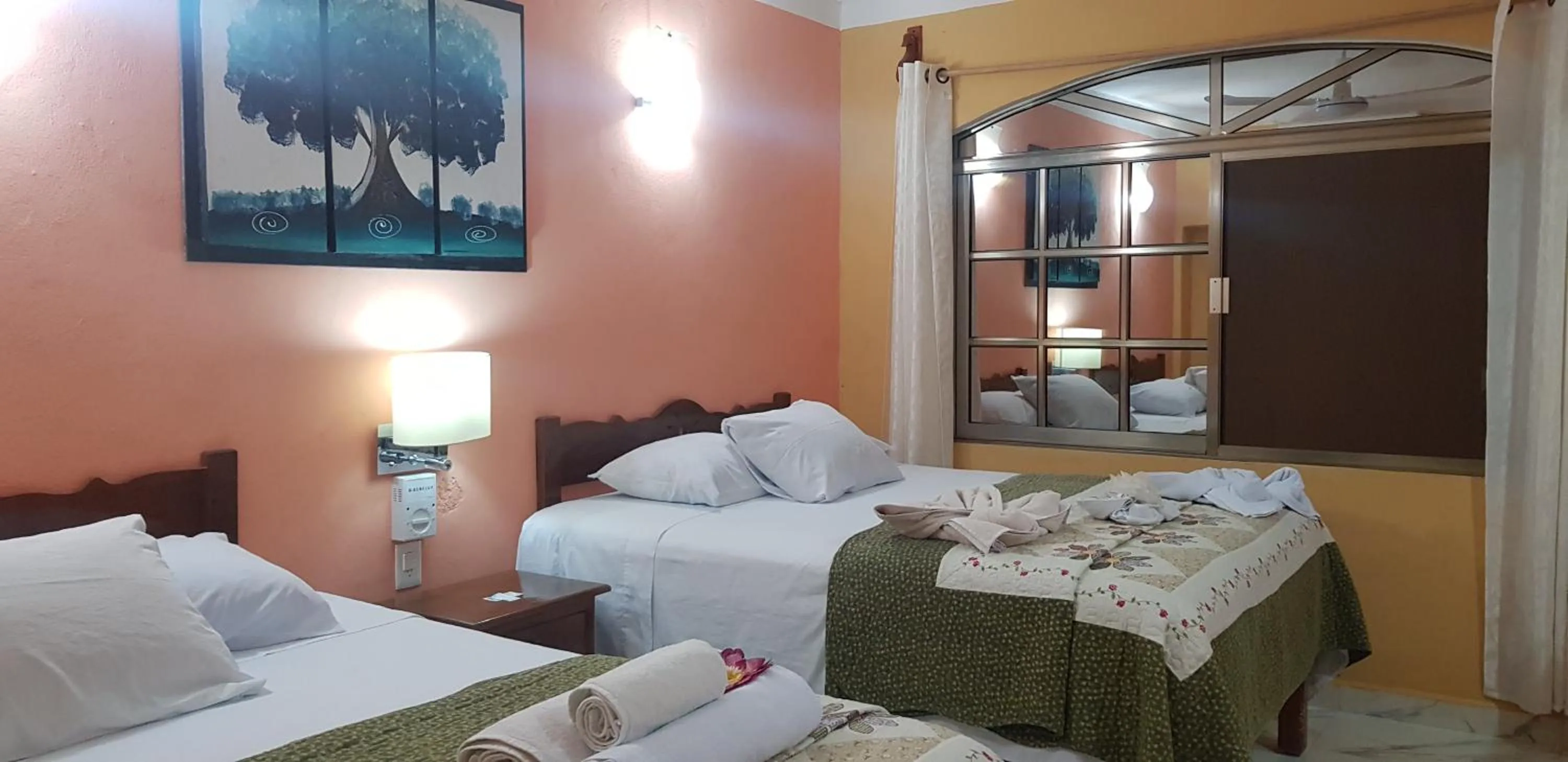 Bed in Hotel Mayahau Coba