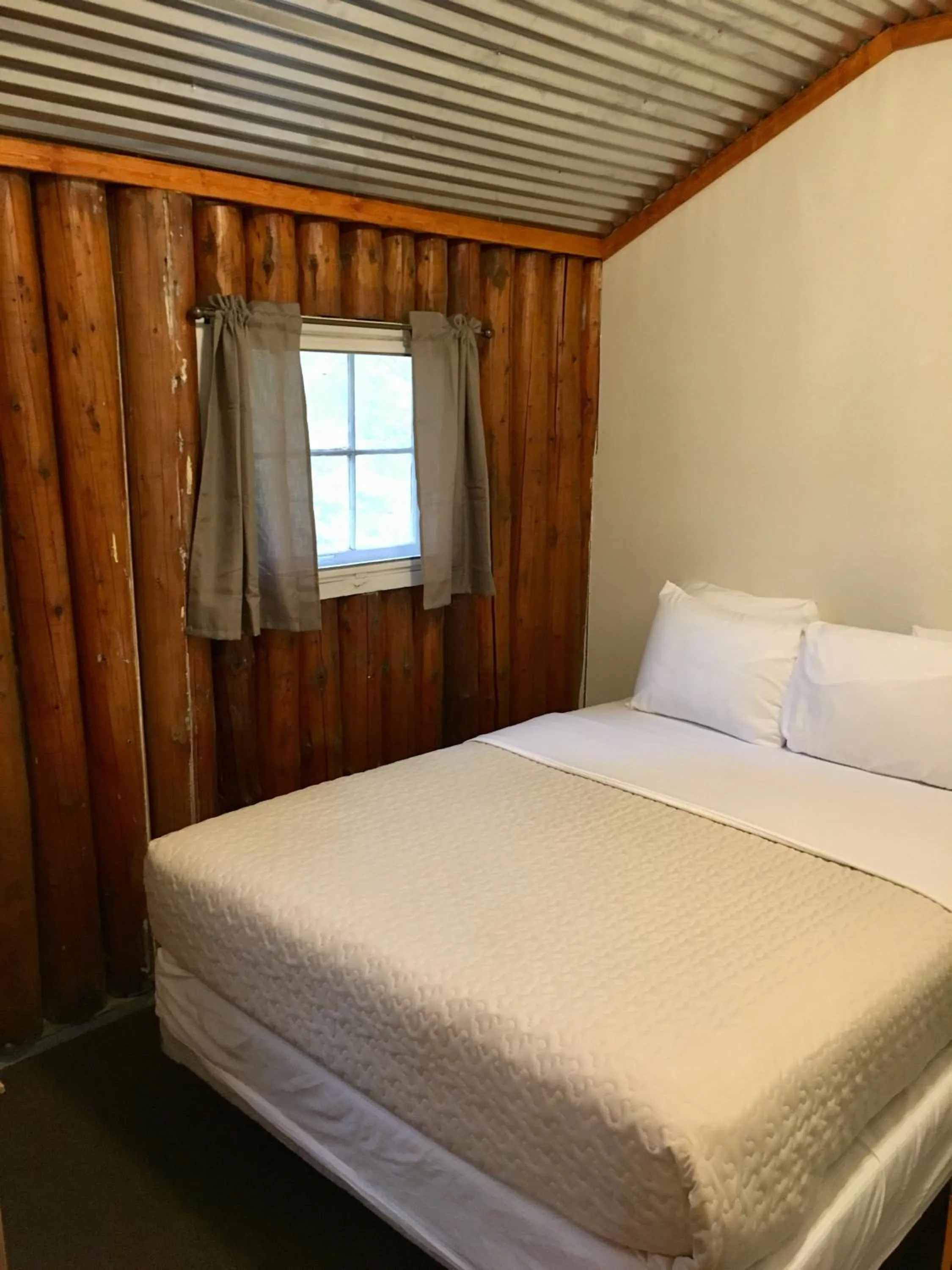 Bed in Hanging Horn Lakeside Resort