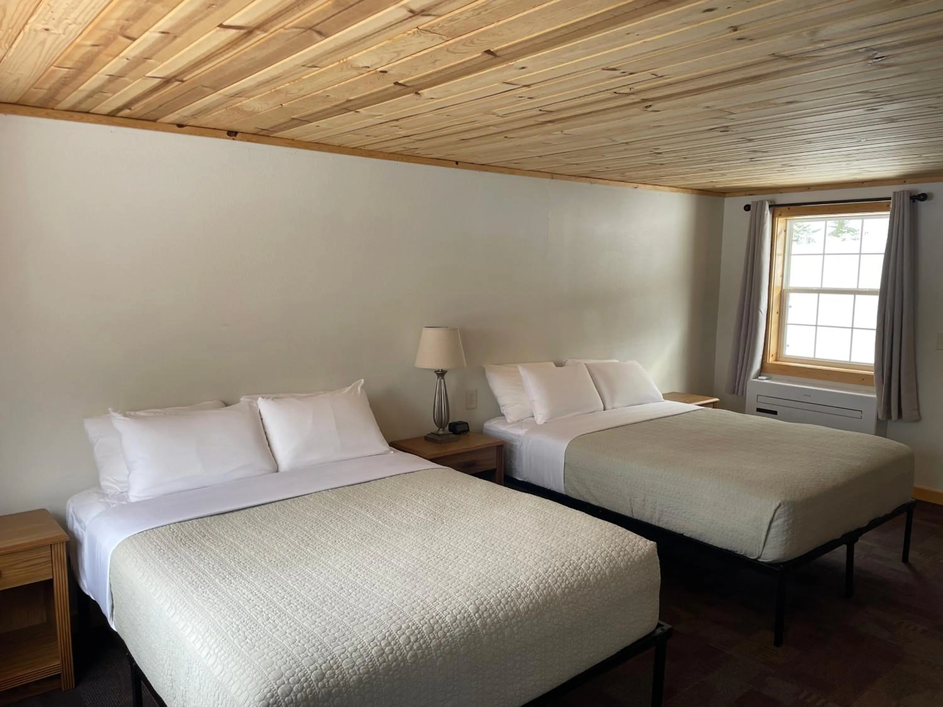 Bed in Hanging Horn Lakeside Resort