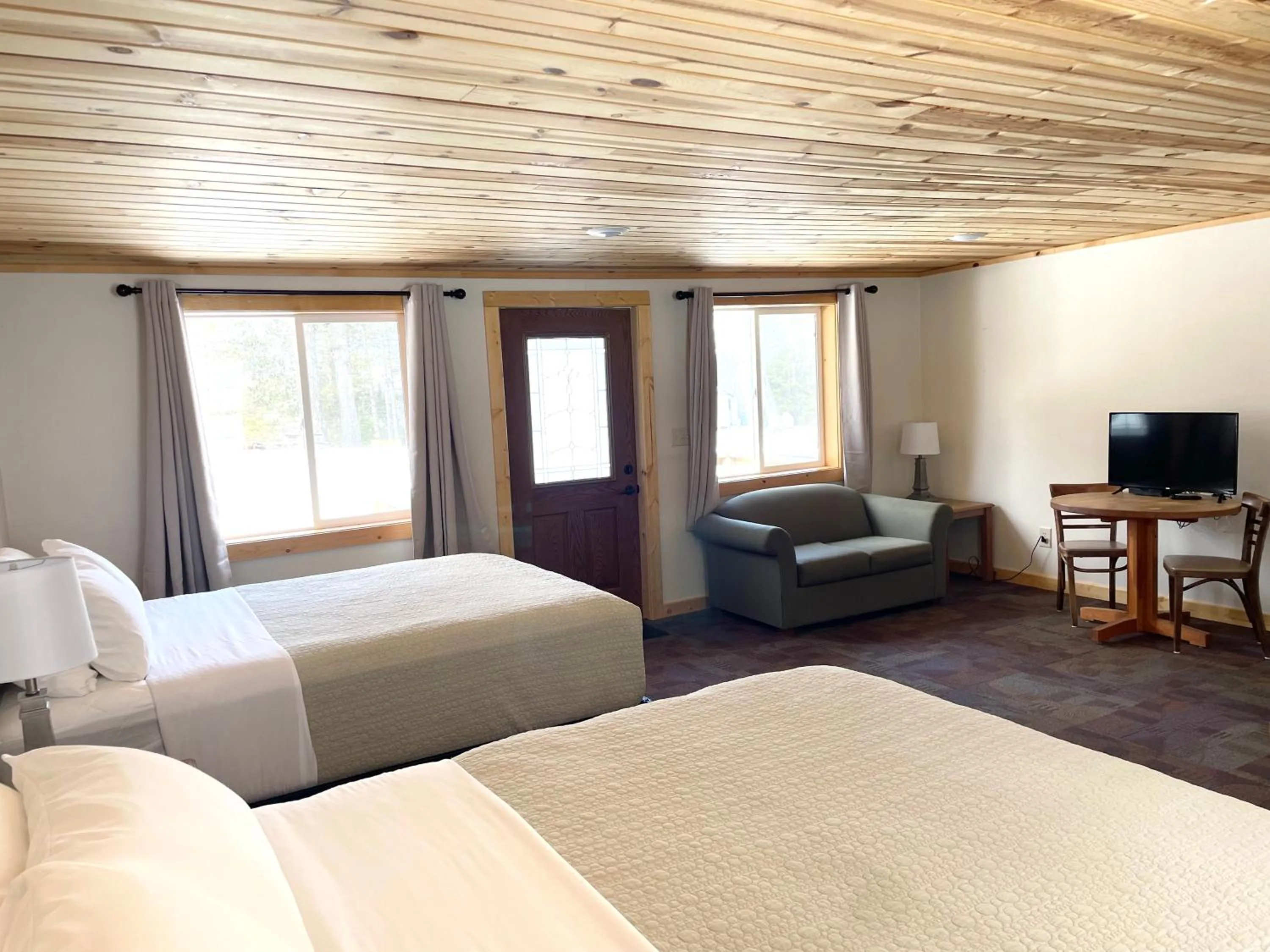 Bed in Hanging Horn Lakeside Resort