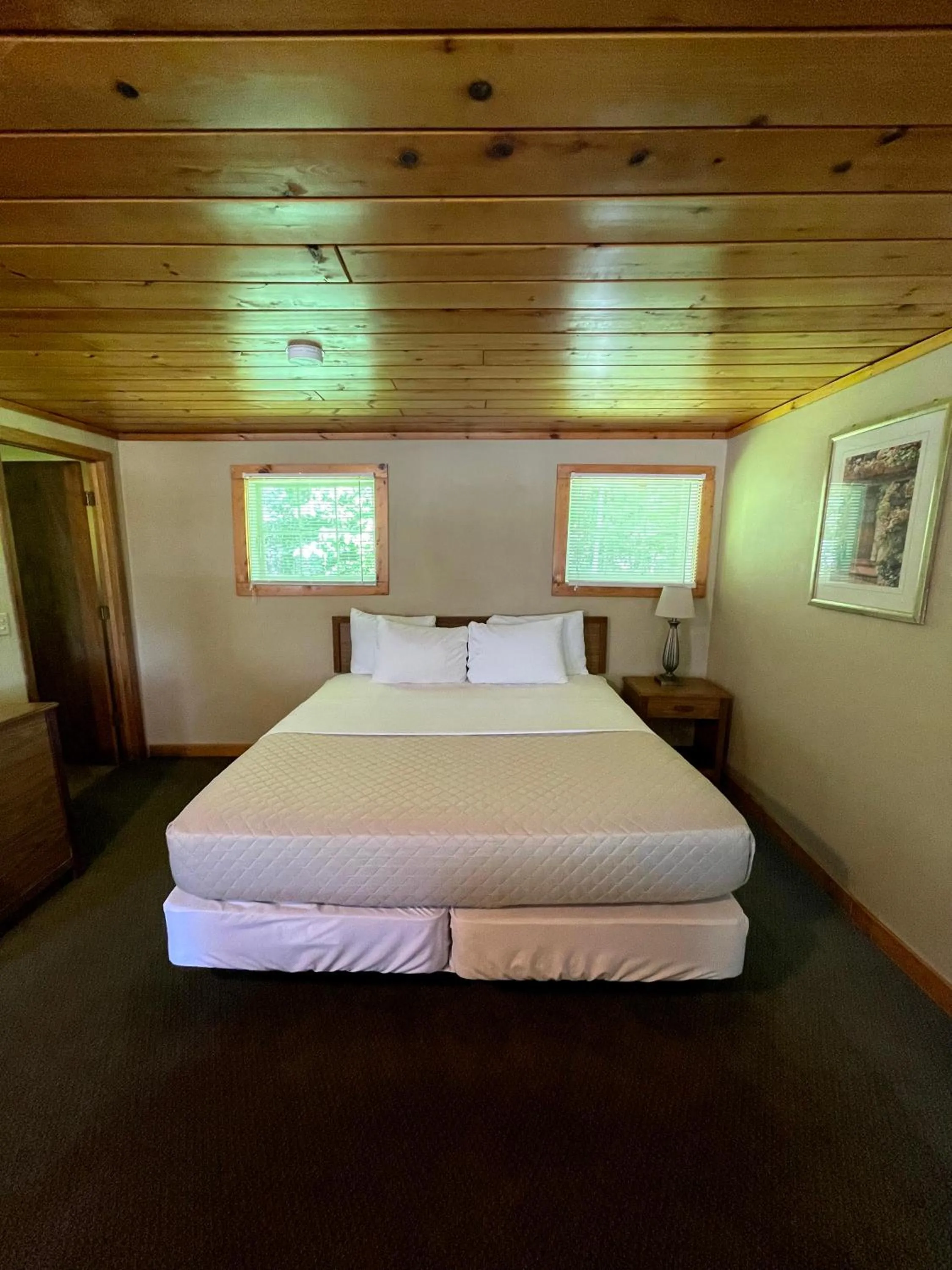 Bed in Hanging Horn Lakeside Resort