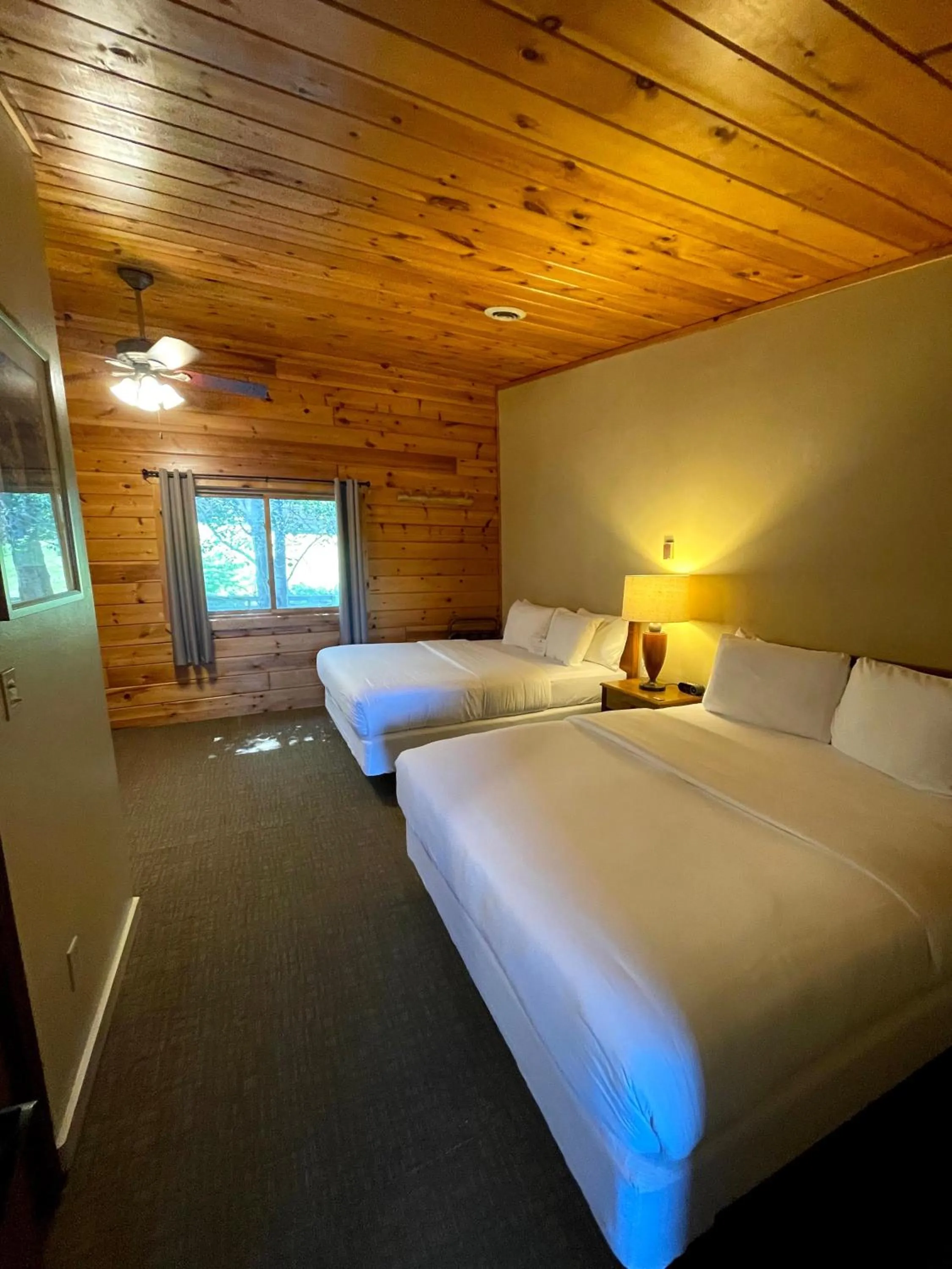 Bed in Hanging Horn Lakeside Resort