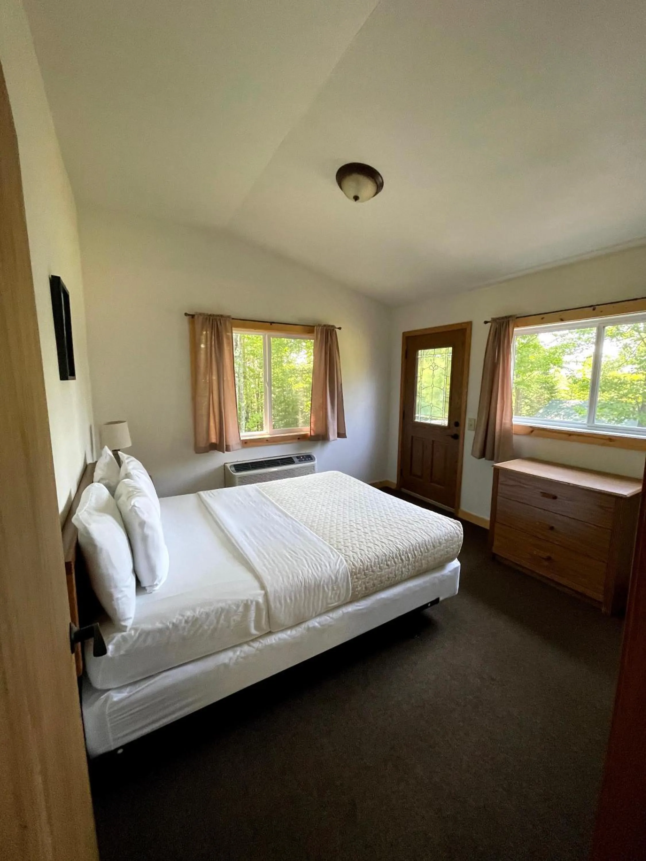 Bed in Hanging Horn Lakeside Resort