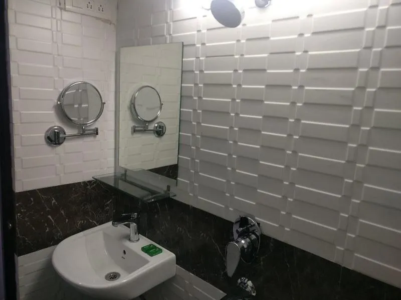 Bathroom in Hotel KK Residency