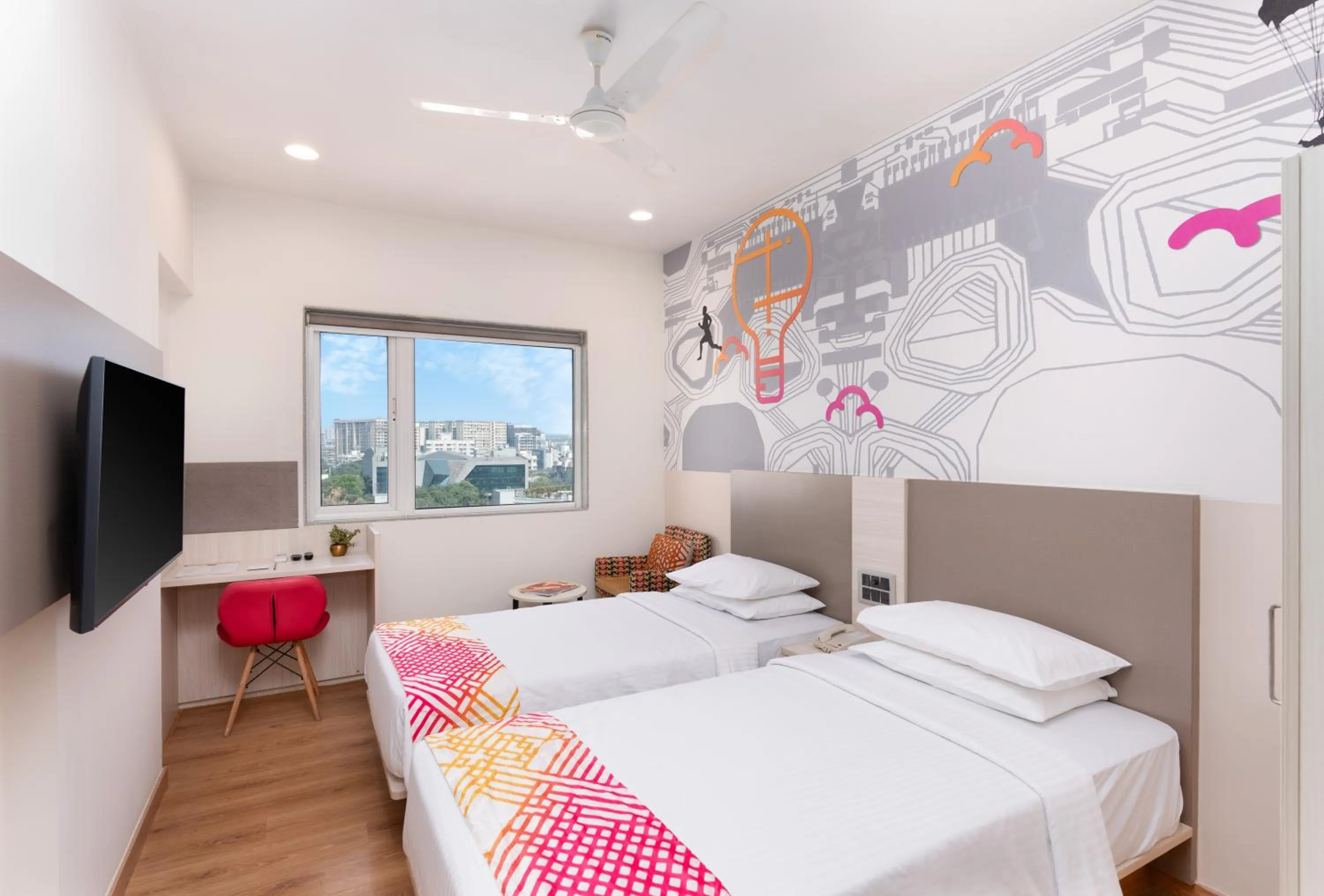 Communal lounge/ TV room, Bed in Ginger Mumbai, Andheri