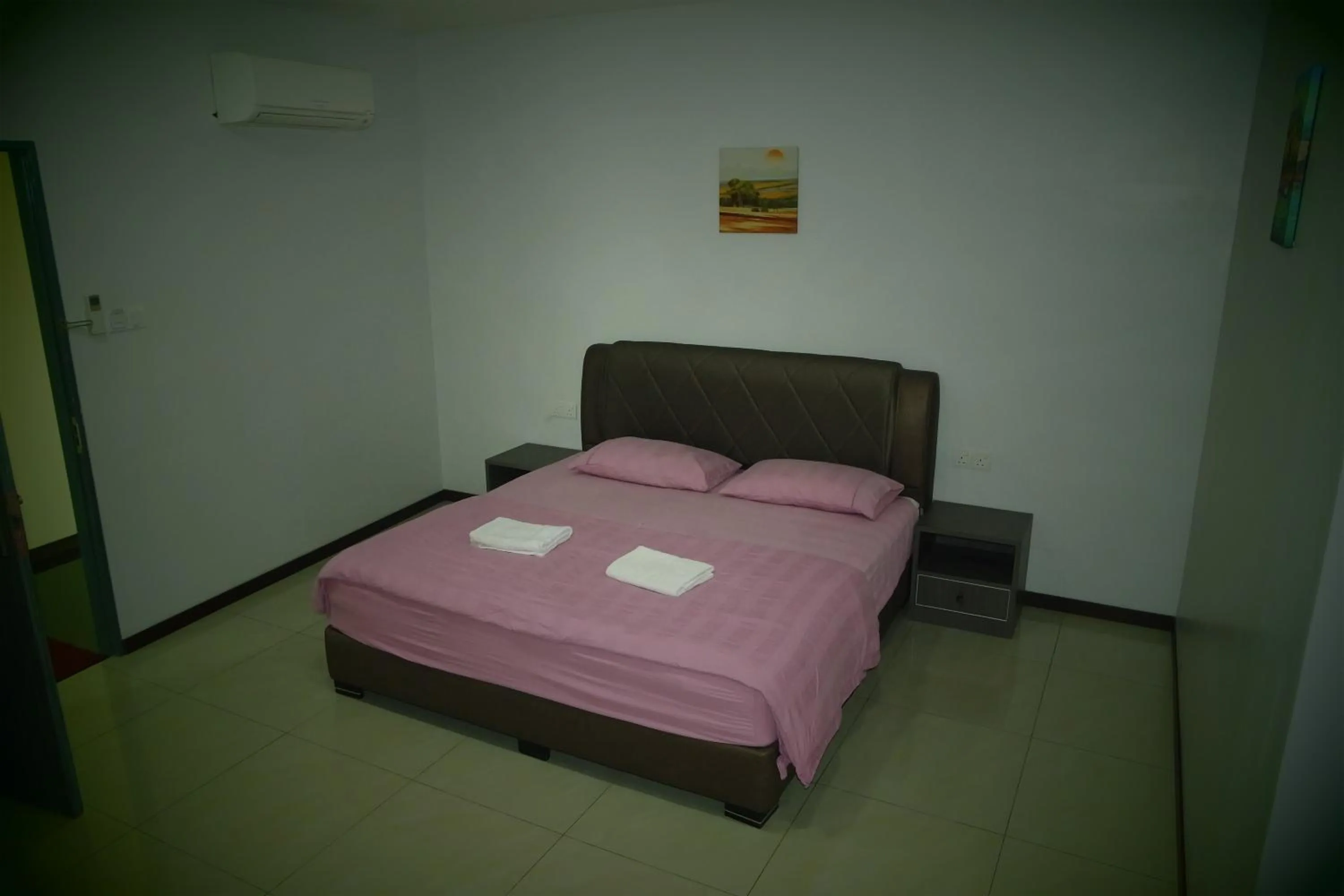 Bed in Lim Mini Hotel