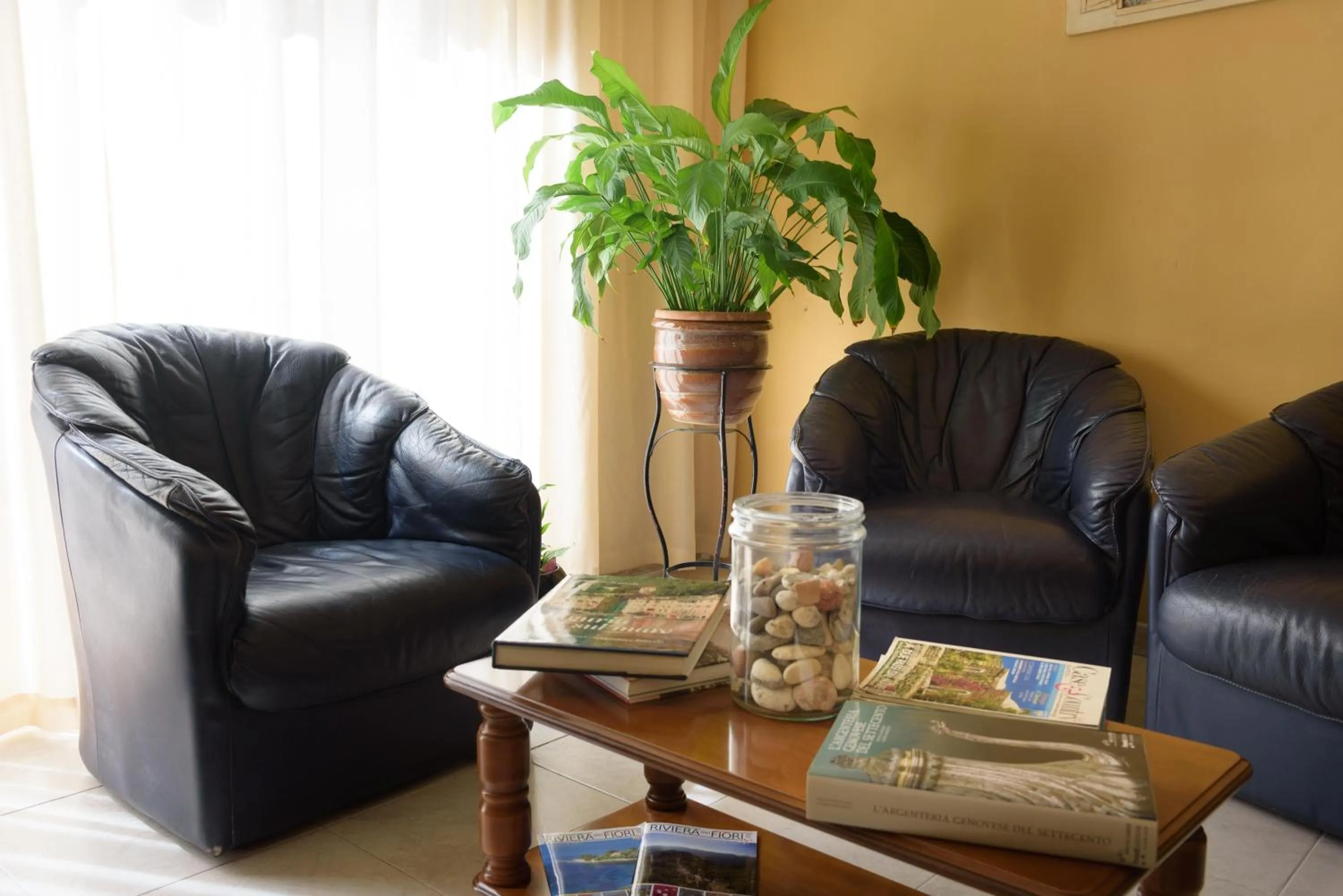 Communal lounge/ TV room in Hotel Morchio Mhotelsgroup