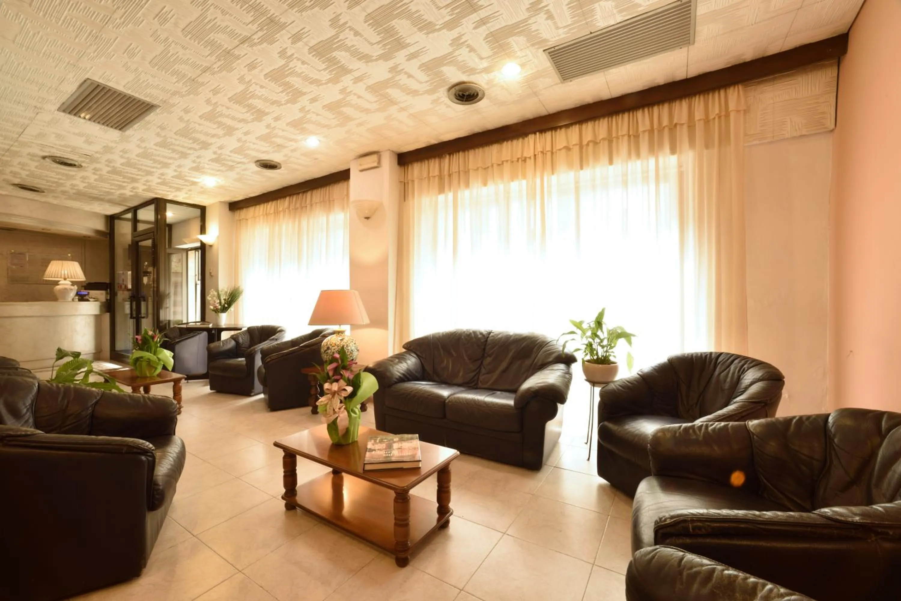 Living room in Hotel Morchio Mhotelsgroup