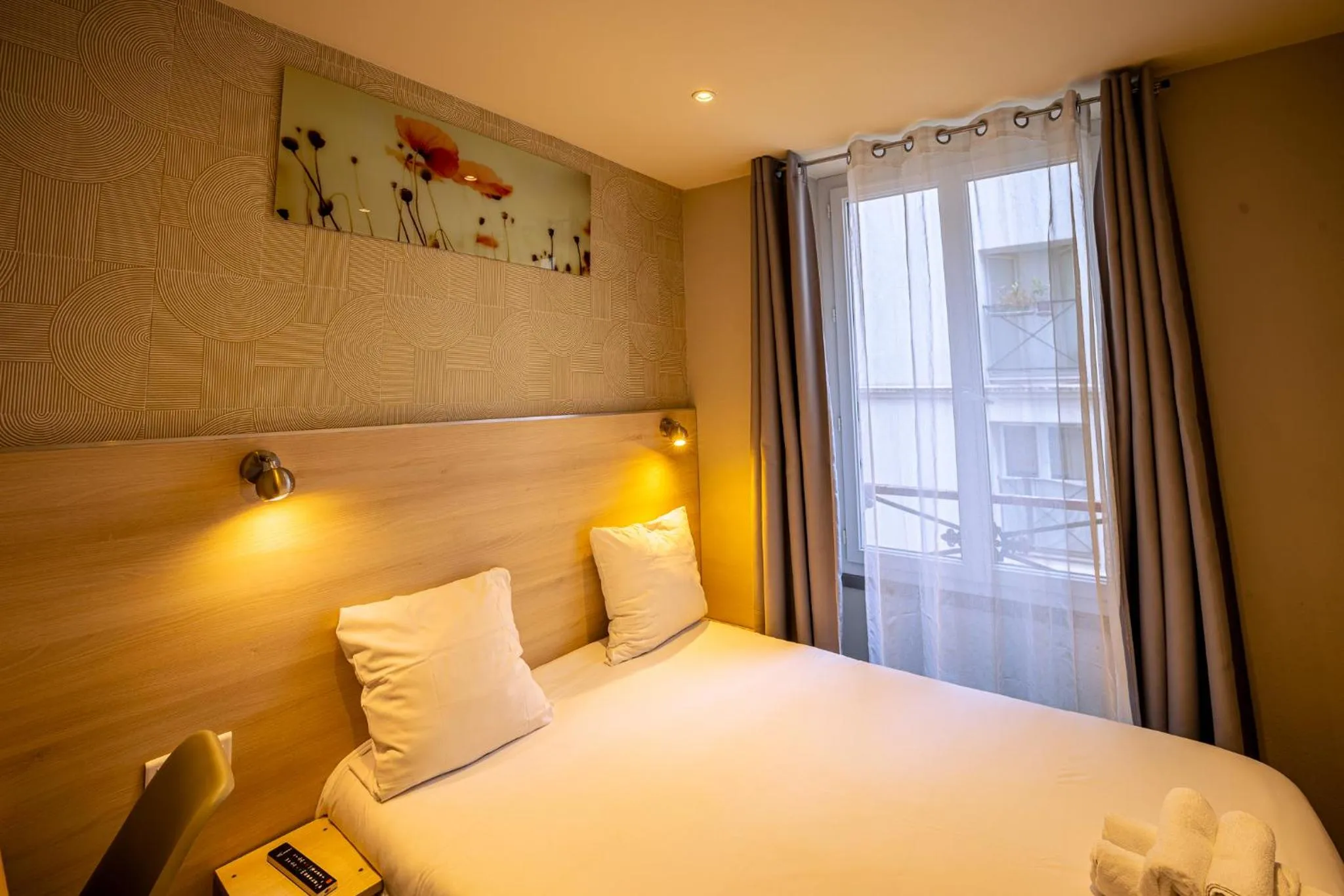 Bed in Hotel Aix Europe