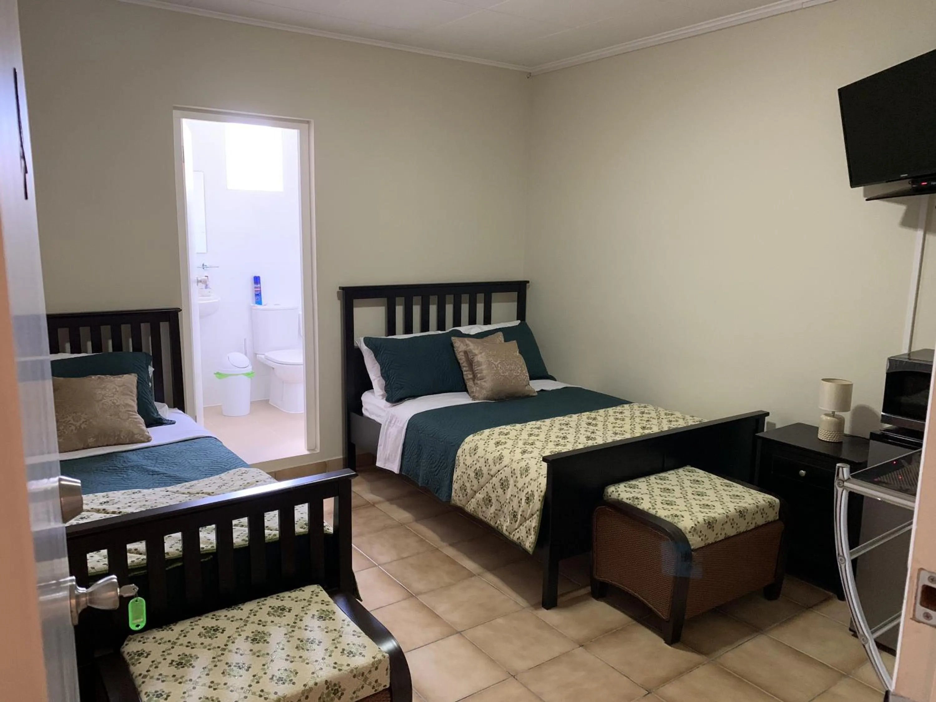 Photo of the whole room, Bed in Eve's Residence