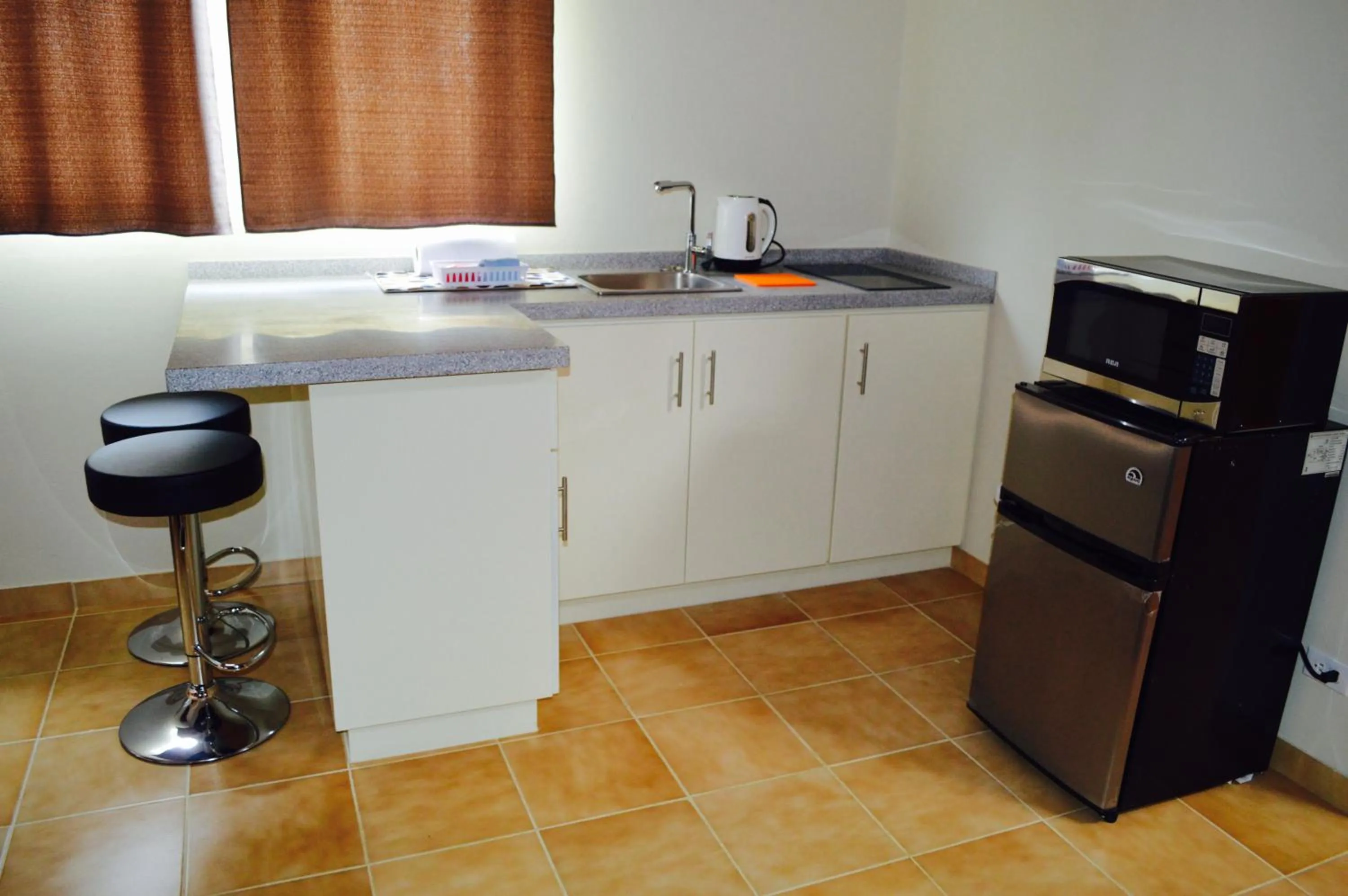 Kitchen or kitchenette in Eve's Residence