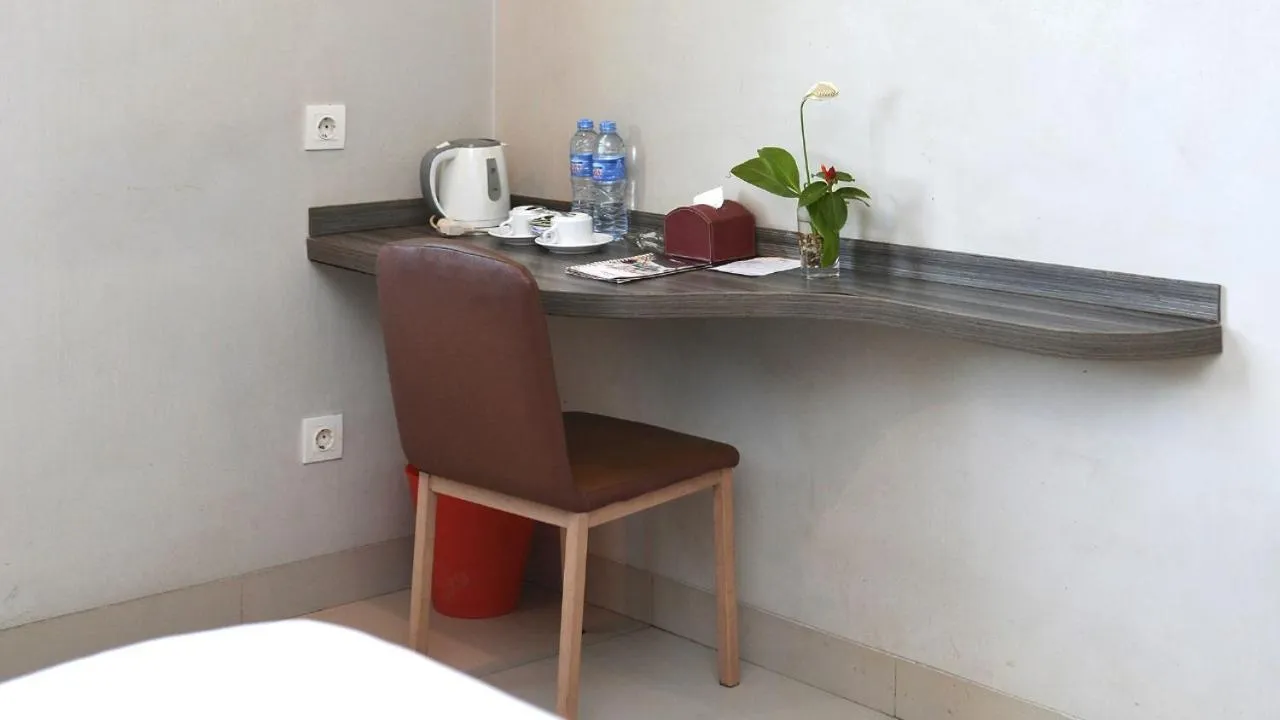 Seating area, Bed in Urban Style Hotel Lampung, Azana Hotels Collection