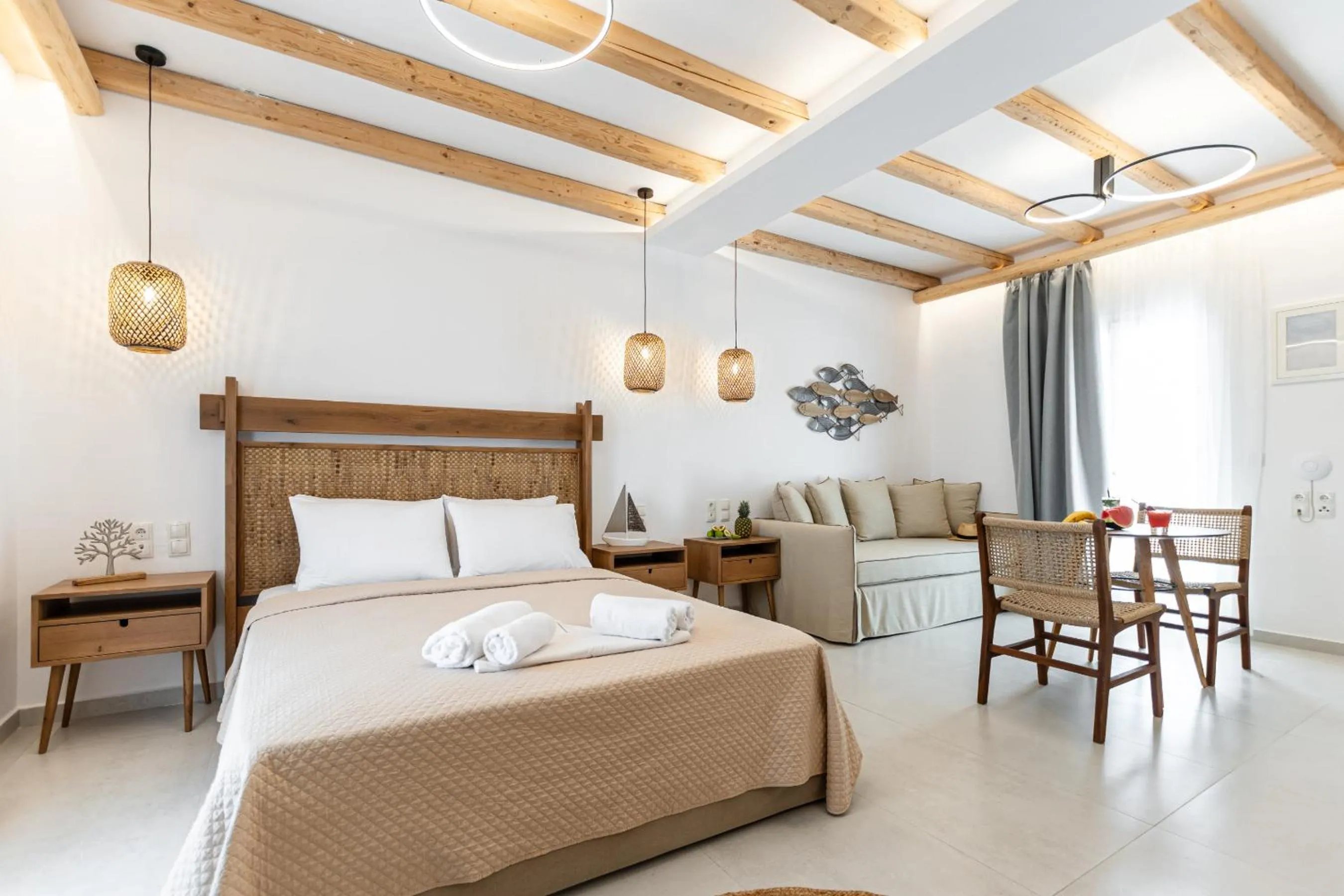 Bed in Birikos Hotel & Suites