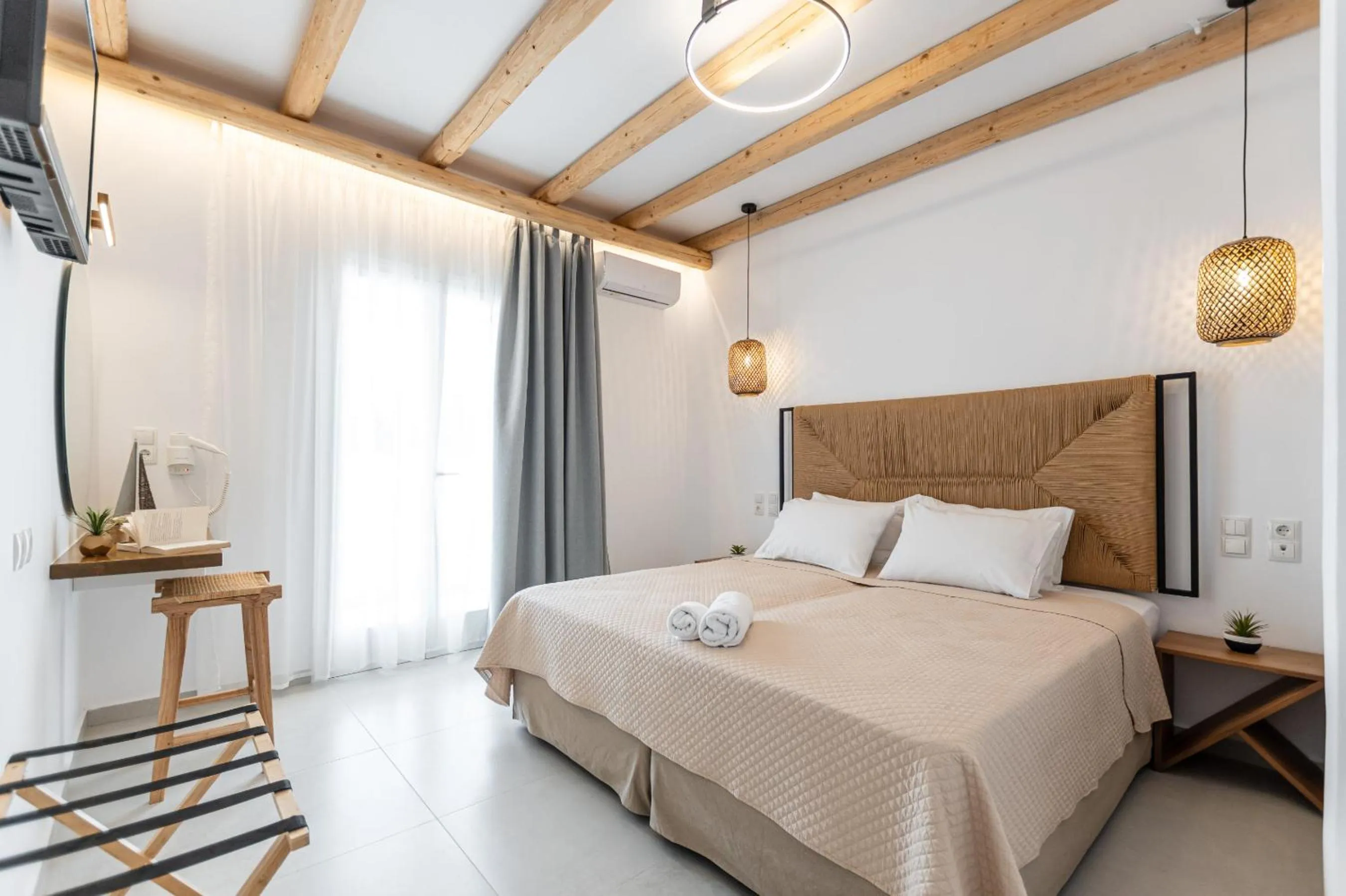 Bed in Birikos Hotel & Suites