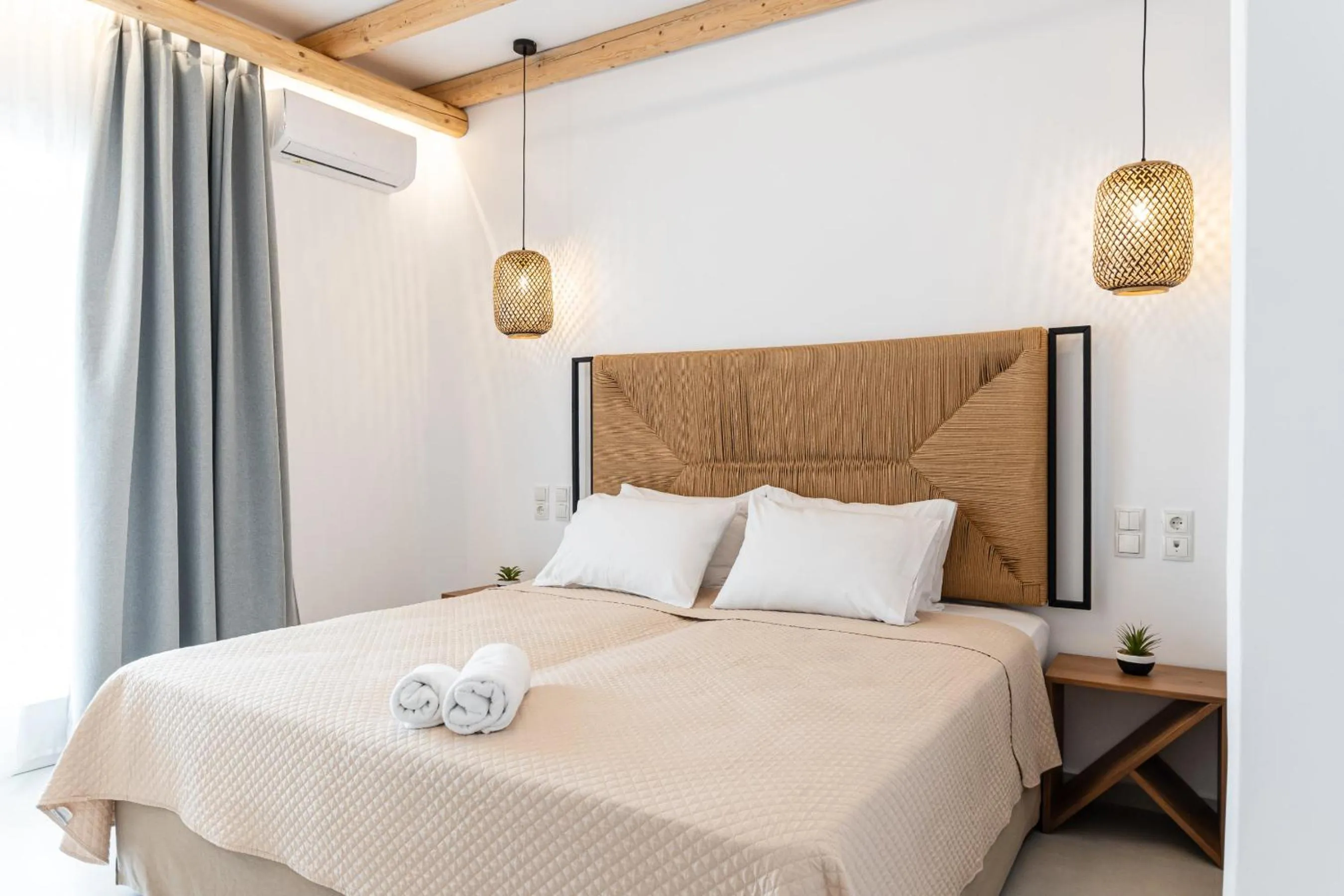 Bed in Birikos Hotel & Suites